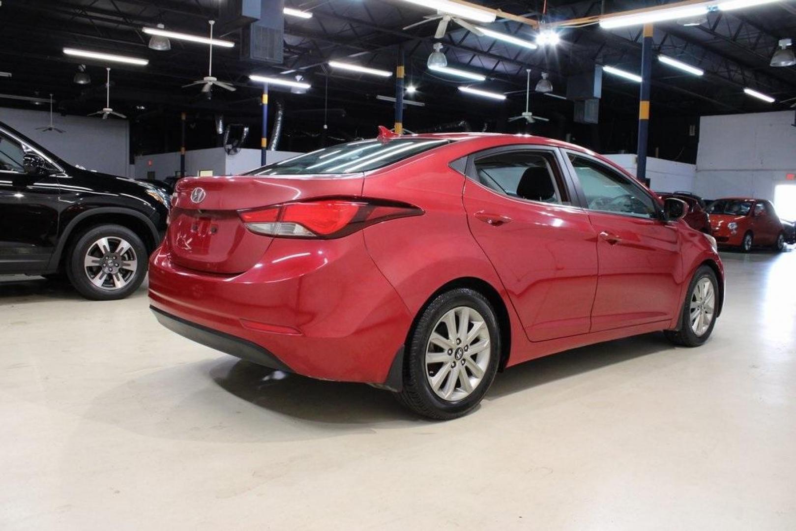 2015 Geranium Red /Black Hyundai Elantra SE (KMHDH4AE6FU) with an 1.8L I4 MPI DOHC 16V ULEV II 145hp engine, Automatic transmission, located at 15300 Midway Rd., Addison, TX, 75001, (972) 702-0011, 32.958321, -96.838074 - Photo#2