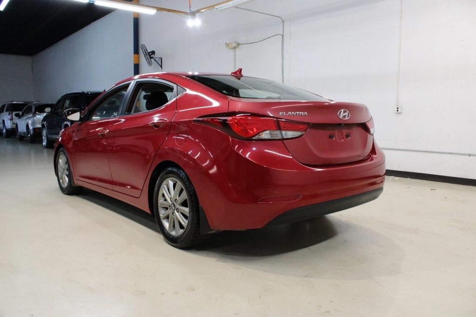 2015 Geranium Red /Black Hyundai Elantra SE (KMHDH4AE6FU) with an 1.8L I4 MPI DOHC 16V ULEV II 145hp engine, Automatic transmission, located at 15300 Midway Rd., Addison, TX, 75001, (972) 702-0011, 32.958321, -96.838074 - Photo#3