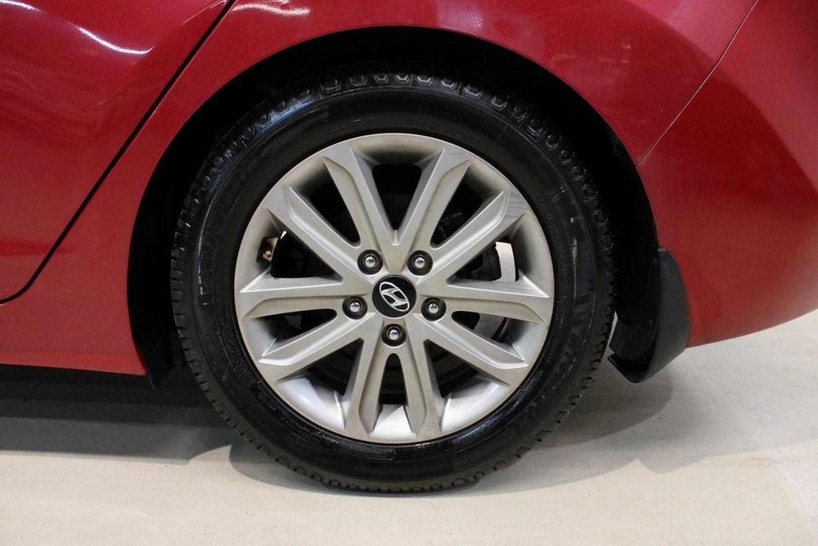 2015 Geranium Red /Black Hyundai Elantra SE (KMHDH4AE6FU) with an 1.8L I4 MPI DOHC 16V ULEV II 145hp engine, Automatic transmission, located at 15300 Midway Rd., Addison, TX, 75001, (972) 702-0011, 32.958321, -96.838074 - Photo#8