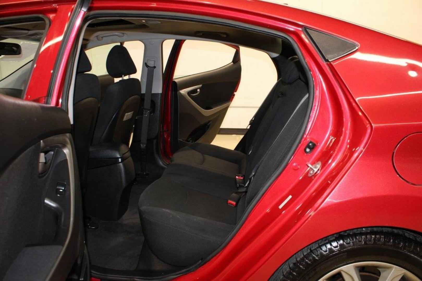 2015 Geranium Red /Black Hyundai Elantra SE (KMHDH4AE6FU) with an 1.8L I4 MPI DOHC 16V ULEV II 145hp engine, Automatic transmission, located at 15300 Midway Rd., Addison, TX, 75001, (972) 702-0011, 32.958321, -96.838074 - Photo#14