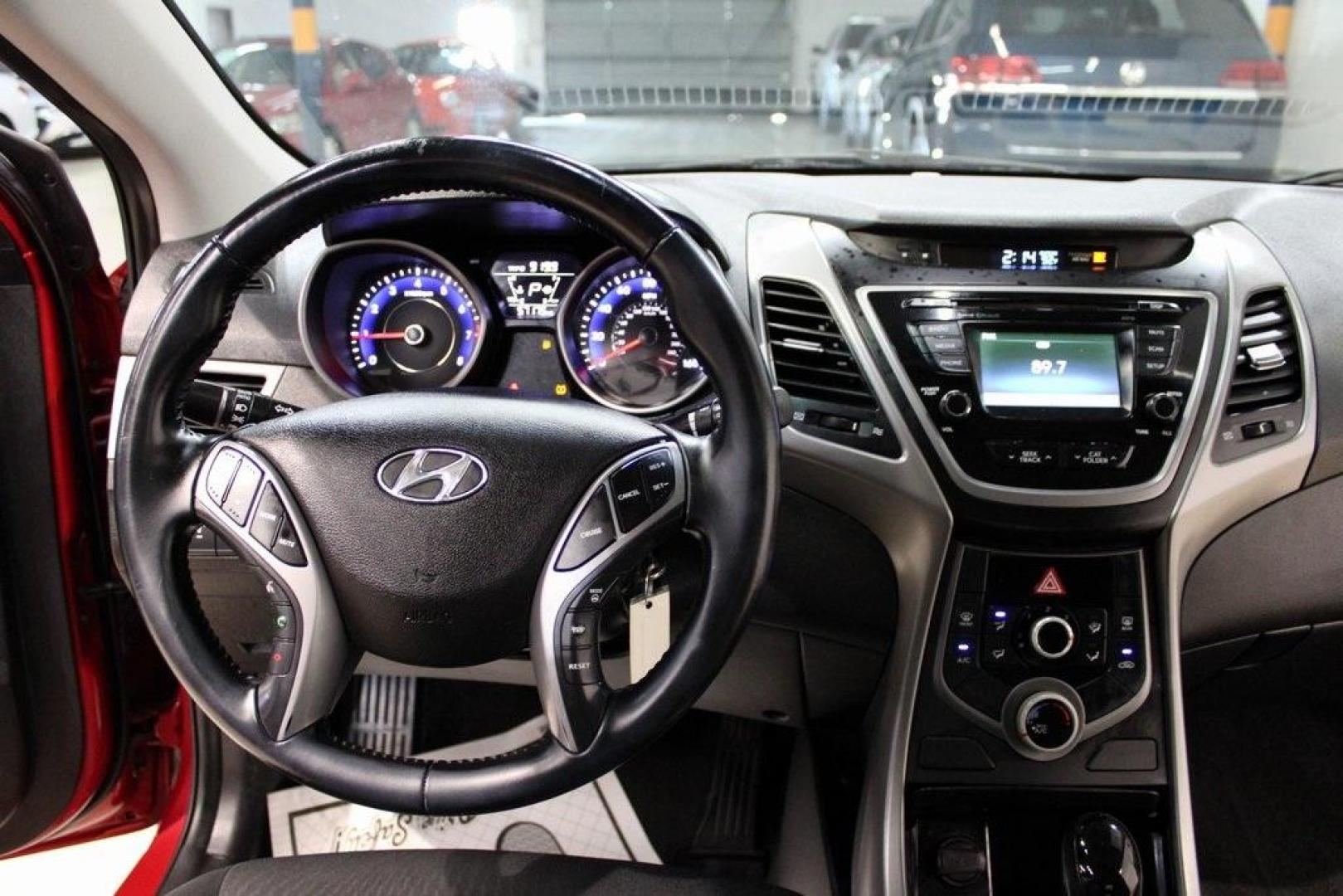 2015 Geranium Red /Black Hyundai Elantra SE (KMHDH4AE6FU) with an 1.8L I4 MPI DOHC 16V ULEV II 145hp engine, Automatic transmission, located at 15300 Midway Rd., Addison, TX, 75001, (972) 702-0011, 32.958321, -96.838074 - Photo#15