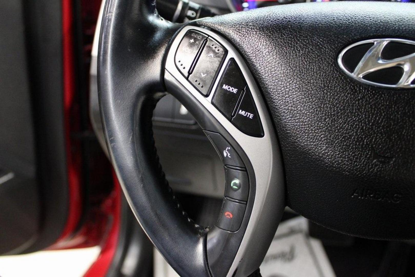 2015 Geranium Red /Black Hyundai Elantra SE (KMHDH4AE6FU) with an 1.8L I4 MPI DOHC 16V ULEV II 145hp engine, Automatic transmission, located at 15300 Midway Rd., Addison, TX, 75001, (972) 702-0011, 32.958321, -96.838074 - Photo#21