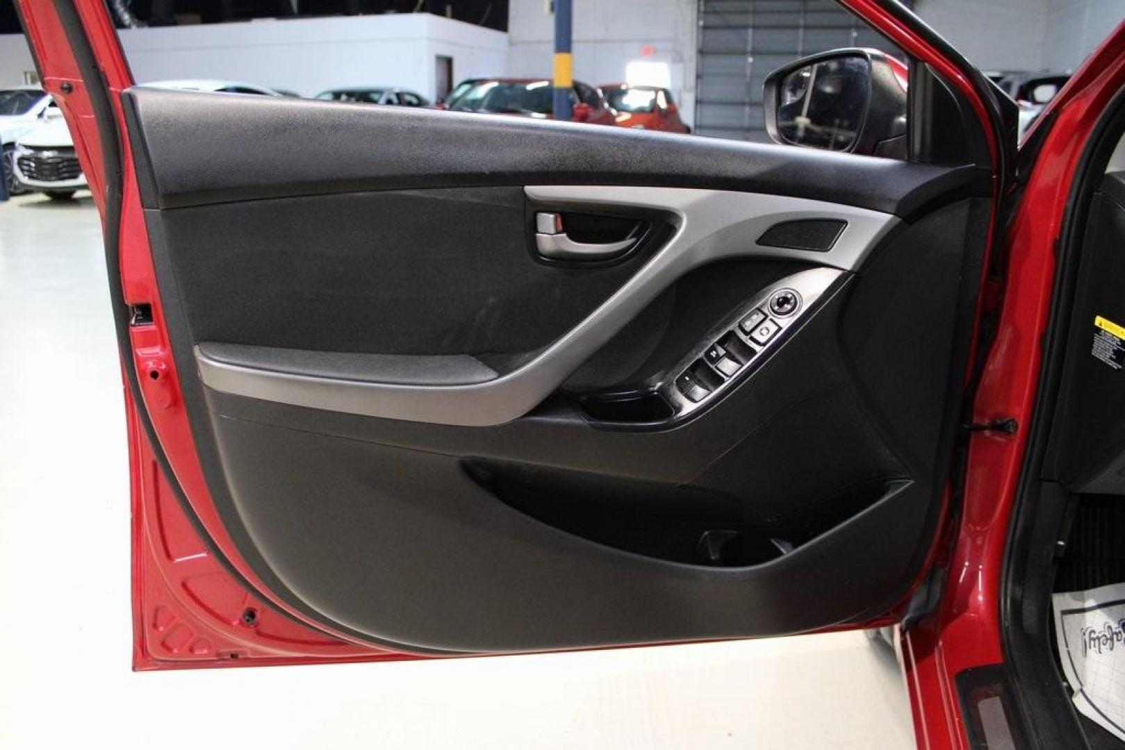 2015 Geranium Red /Black Hyundai Elantra SE (KMHDH4AE6FU) with an 1.8L I4 MPI DOHC 16V ULEV II 145hp engine, Automatic transmission, located at 15300 Midway Rd., Addison, TX, 75001, (972) 702-0011, 32.958321, -96.838074 - Photo#23