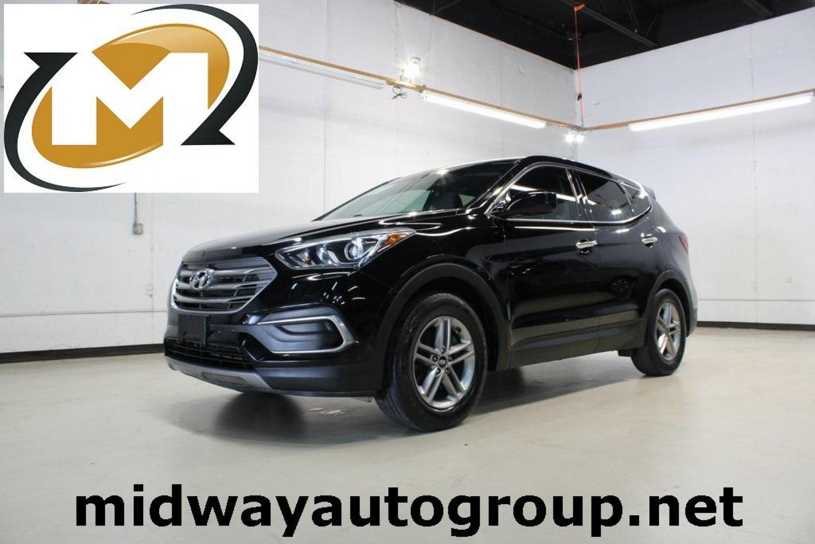 2018 Twilight Black /Gray Hyundai Santa Fe Sport 2.4 Base (5XYZT3LBXJG) with an 2.4L I4 DGI DOHC 16V engine, Automatic transmission, located at 15300 Midway Rd., Addison, TX, 75001, (972) 702-0011, 32.958321, -96.838074 - Photo#0