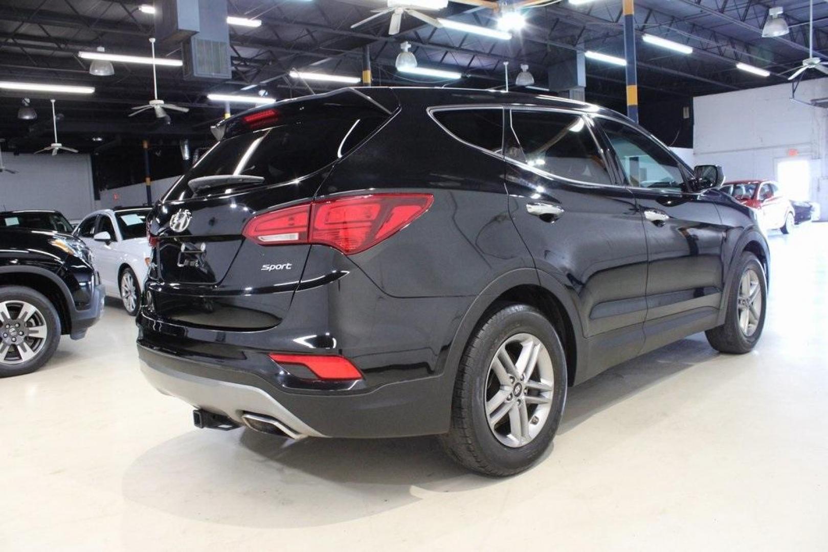 2018 Twilight Black /Gray Hyundai Santa Fe Sport 2.4 Base (5XYZT3LBXJG) with an 2.4L I4 DGI DOHC 16V engine, Automatic transmission, located at 15300 Midway Rd., Addison, TX, 75001, (972) 702-0011, 32.958321, -96.838074 - Photo#2