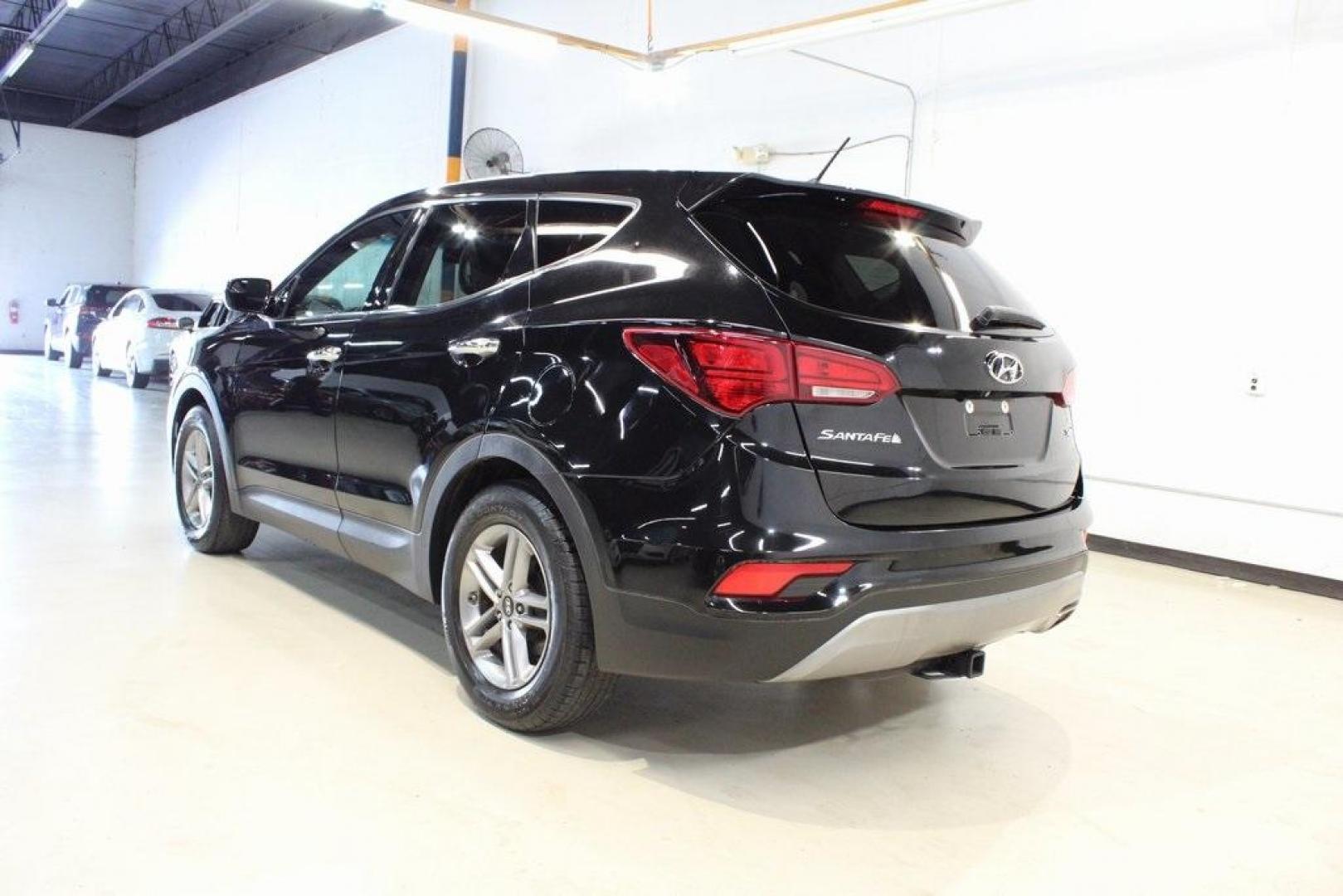 2018 Twilight Black /Gray Hyundai Santa Fe Sport 2.4 Base (5XYZT3LBXJG) with an 2.4L I4 DGI DOHC 16V engine, Automatic transmission, located at 15300 Midway Rd., Addison, TX, 75001, (972) 702-0011, 32.958321, -96.838074 - Photo#3