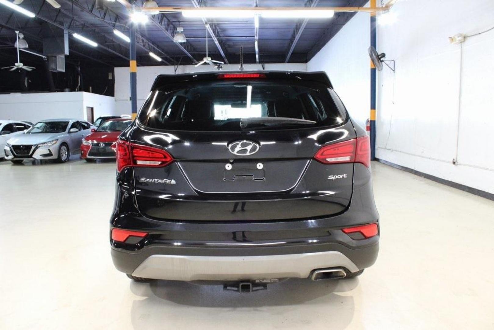 2018 Twilight Black /Gray Hyundai Santa Fe Sport 2.4 Base (5XYZT3LBXJG) with an 2.4L I4 DGI DOHC 16V engine, Automatic transmission, located at 15300 Midway Rd., Addison, TX, 75001, (972) 702-0011, 32.958321, -96.838074 - Photo#7