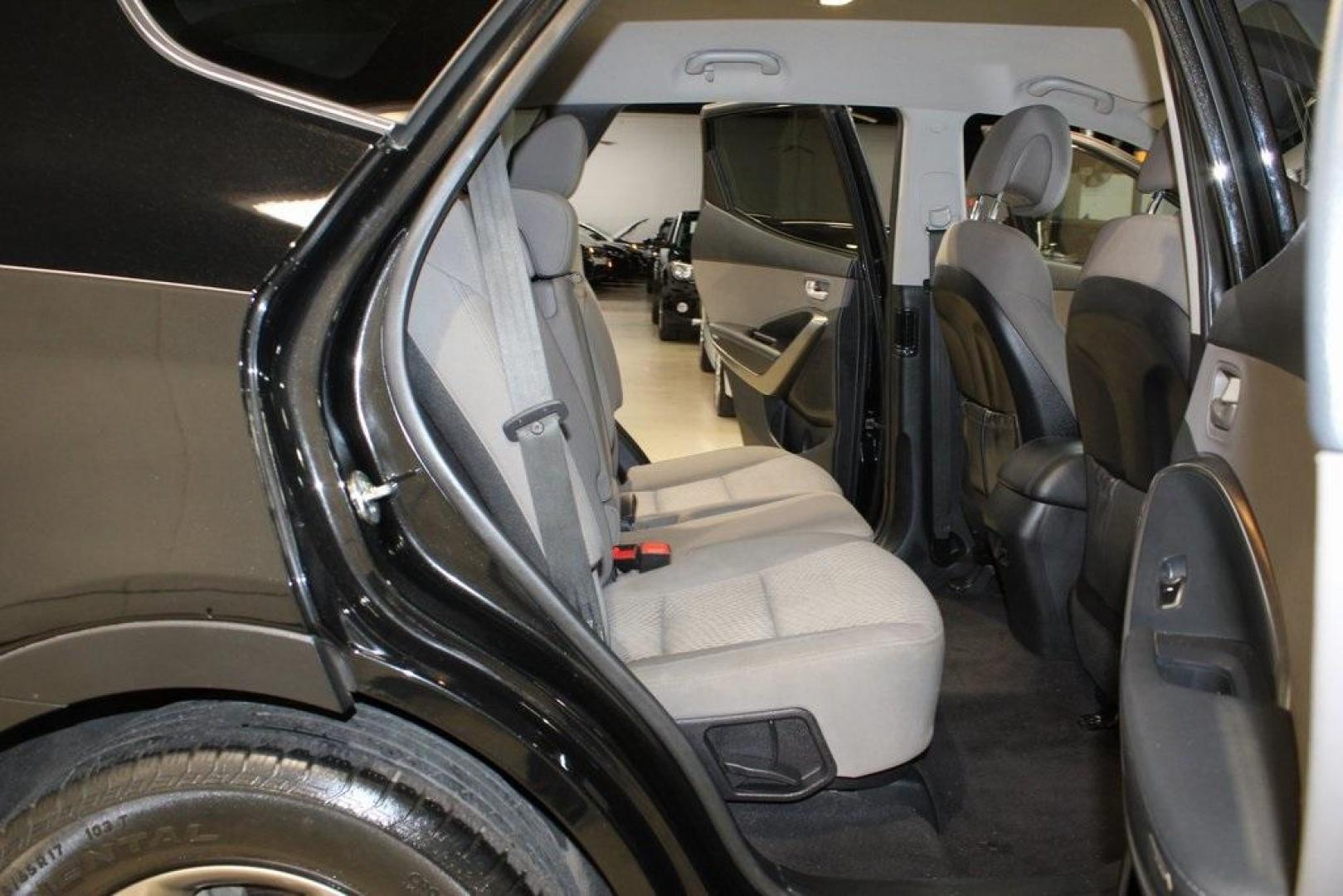 2018 Twilight Black /Gray Hyundai Santa Fe Sport 2.4 Base (5XYZT3LBXJG) with an 2.4L I4 DGI DOHC 16V engine, Automatic transmission, located at 15300 Midway Rd., Addison, TX, 75001, (972) 702-0011, 32.958321, -96.838074 - Photo#14