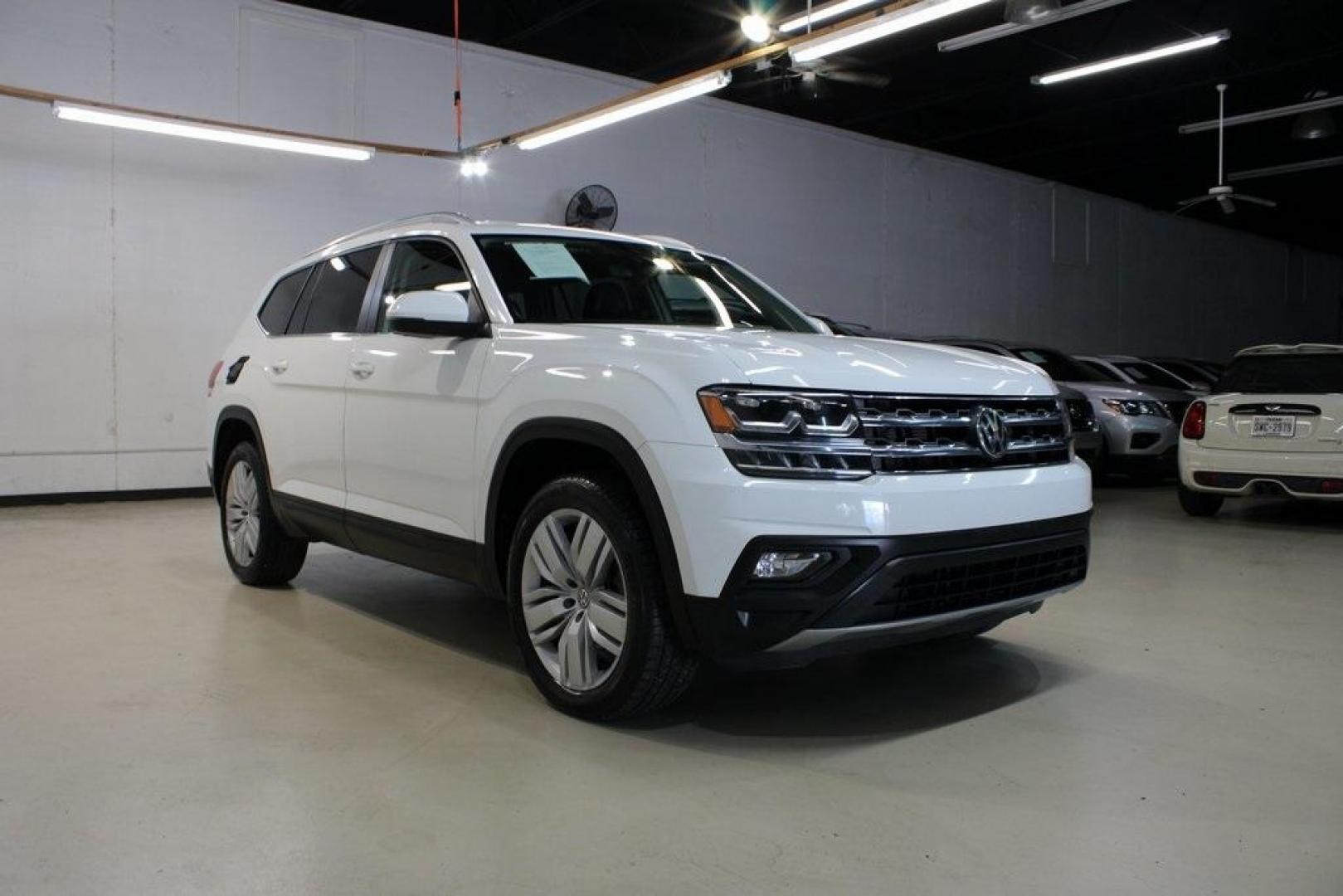 2019 Pure White /Titan Black Volkswagen Atlas 3.6L V6 SE (1V2WR2CA6KC) with an 3.6L VR6 engine, Automatic transmission, located at 15300 Midway Rd., Addison, TX, 75001, (972) 702-0011, 32.958321, -96.838074 - Photo#1