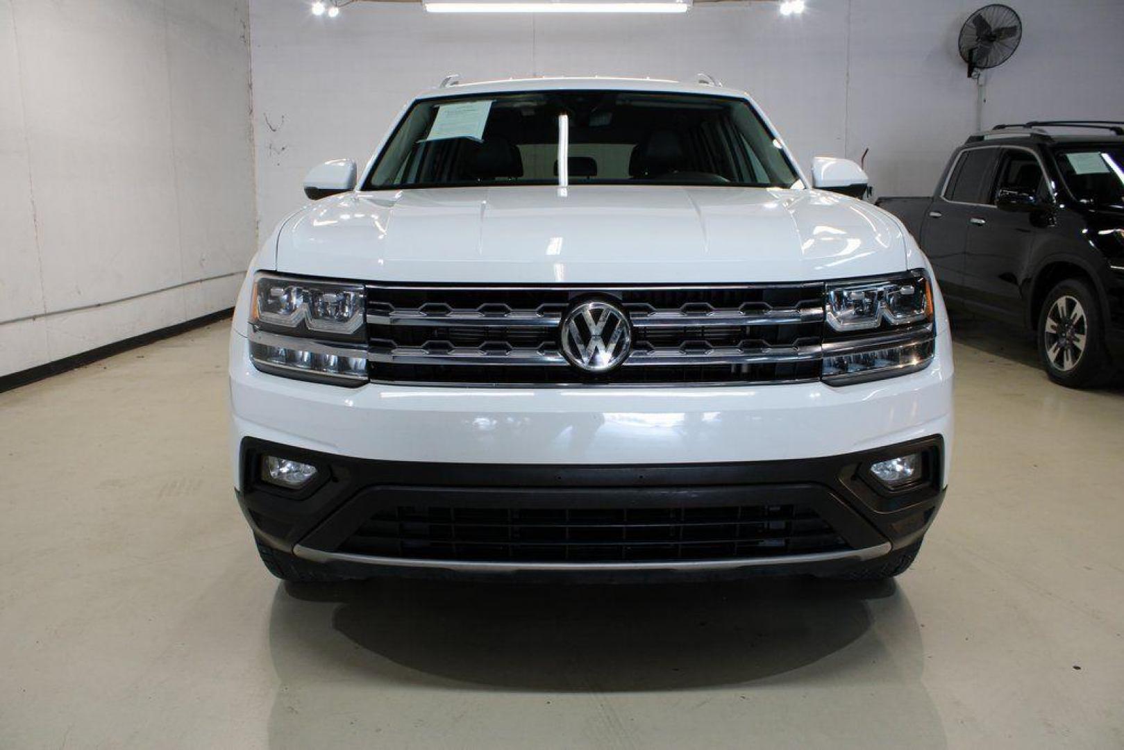 2019 Pure White /Titan Black Volkswagen Atlas 3.6L V6 SE (1V2WR2CA6KC) with an 3.6L VR6 engine, Automatic transmission, located at 15300 Midway Rd., Addison, TX, 75001, (972) 702-0011, 32.958321, -96.838074 - 2019 Volkswagen Atlas SE 4MOTION<br><br>Now Available at Midway Auto Group Addison, Texas<br><br>Spacious, powerful, and family-ready, the 2019 Volkswagen Atlas SE 4MOTION delivers three-row versatility with the confidence of Volkswagens all-wheel-drive system. With its roomy cabin, refined ride qu - Photo#5
