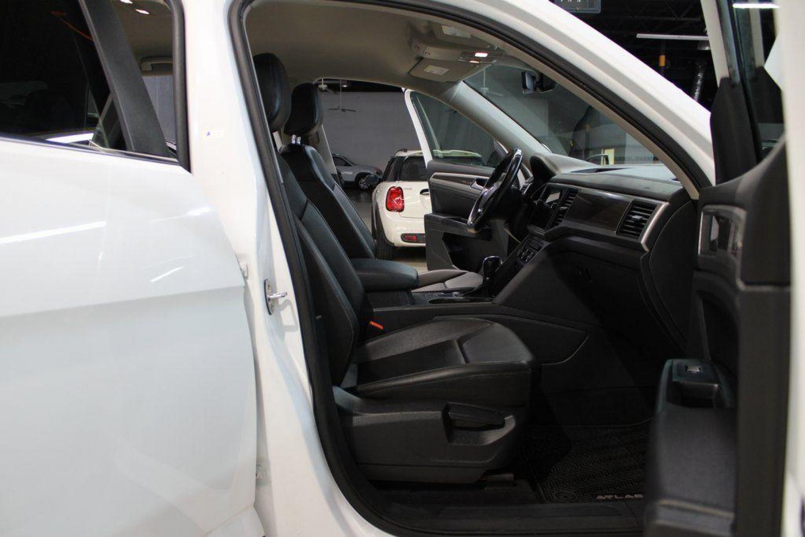 2019 Pure White /Titan Black Volkswagen Atlas 3.6L V6 SE (1V2WR2CA6KC) with an 3.6L VR6 engine, Automatic transmission, located at 15300 Midway Rd., Addison, TX, 75001, (972) 702-0011, 32.958321, -96.838074 - 2019 Volkswagen Atlas SE 4MOTION<br><br>Now Available at Midway Auto Group Addison, Texas<br><br>Spacious, powerful, and family-ready, the 2019 Volkswagen Atlas SE 4MOTION delivers three-row versatility with the confidence of Volkswagens all-wheel-drive system. With its roomy cabin, refined ride qu - Photo#12