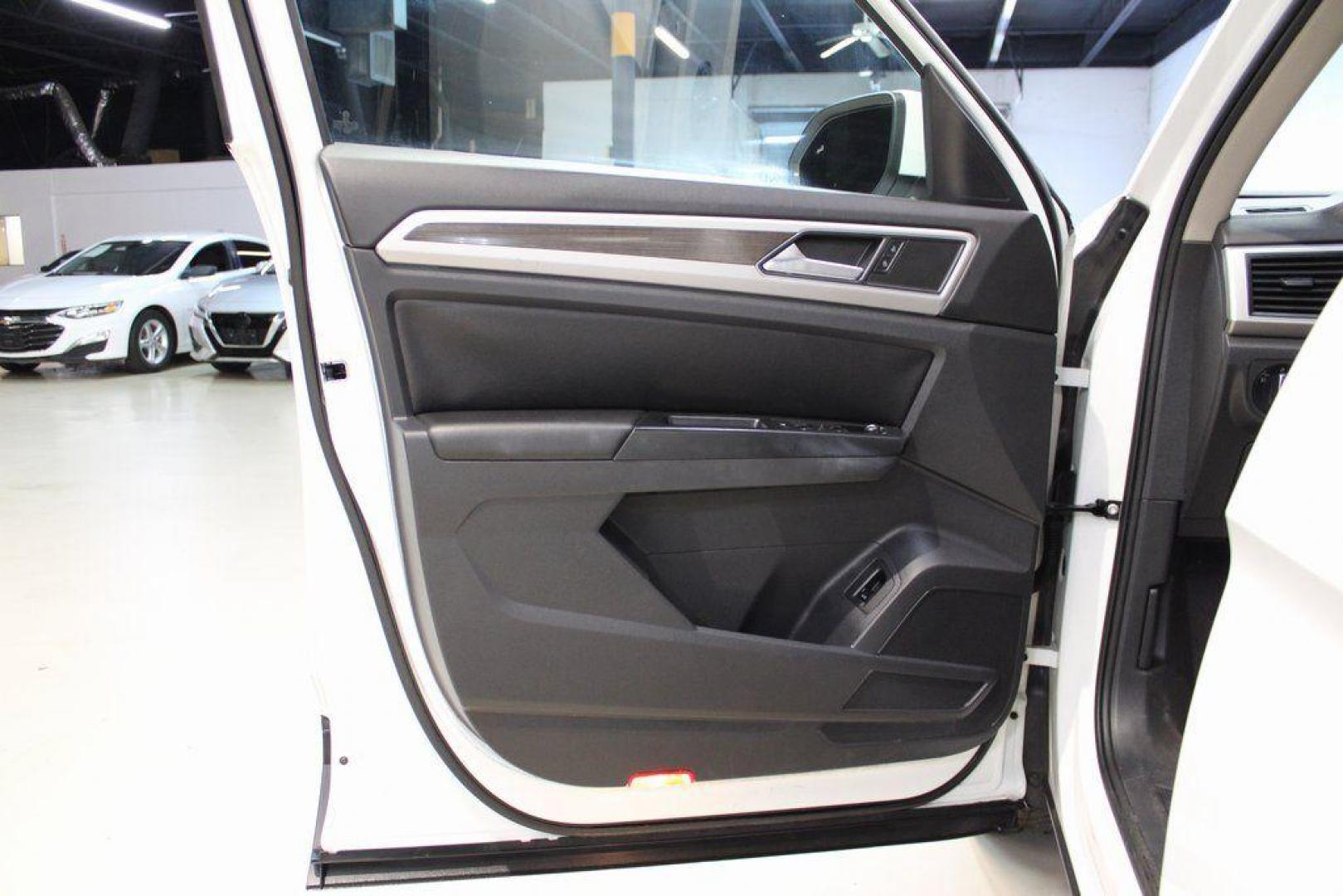 2019 Pure White /Titan Black Volkswagen Atlas 3.6L V6 SE (1V2WR2CA6KC) with an 3.6L VR6 engine, Automatic transmission, located at 15300 Midway Rd., Addison, TX, 75001, (972) 702-0011, 32.958321, -96.838074 - 2019 Volkswagen Atlas SE 4MOTION<br><br>Now Available at Midway Auto Group Addison, Texas<br><br>Spacious, powerful, and family-ready, the 2019 Volkswagen Atlas SE 4MOTION delivers three-row versatility with the confidence of Volkswagens all-wheel-drive system. With its roomy cabin, refined ride qu - Photo#25