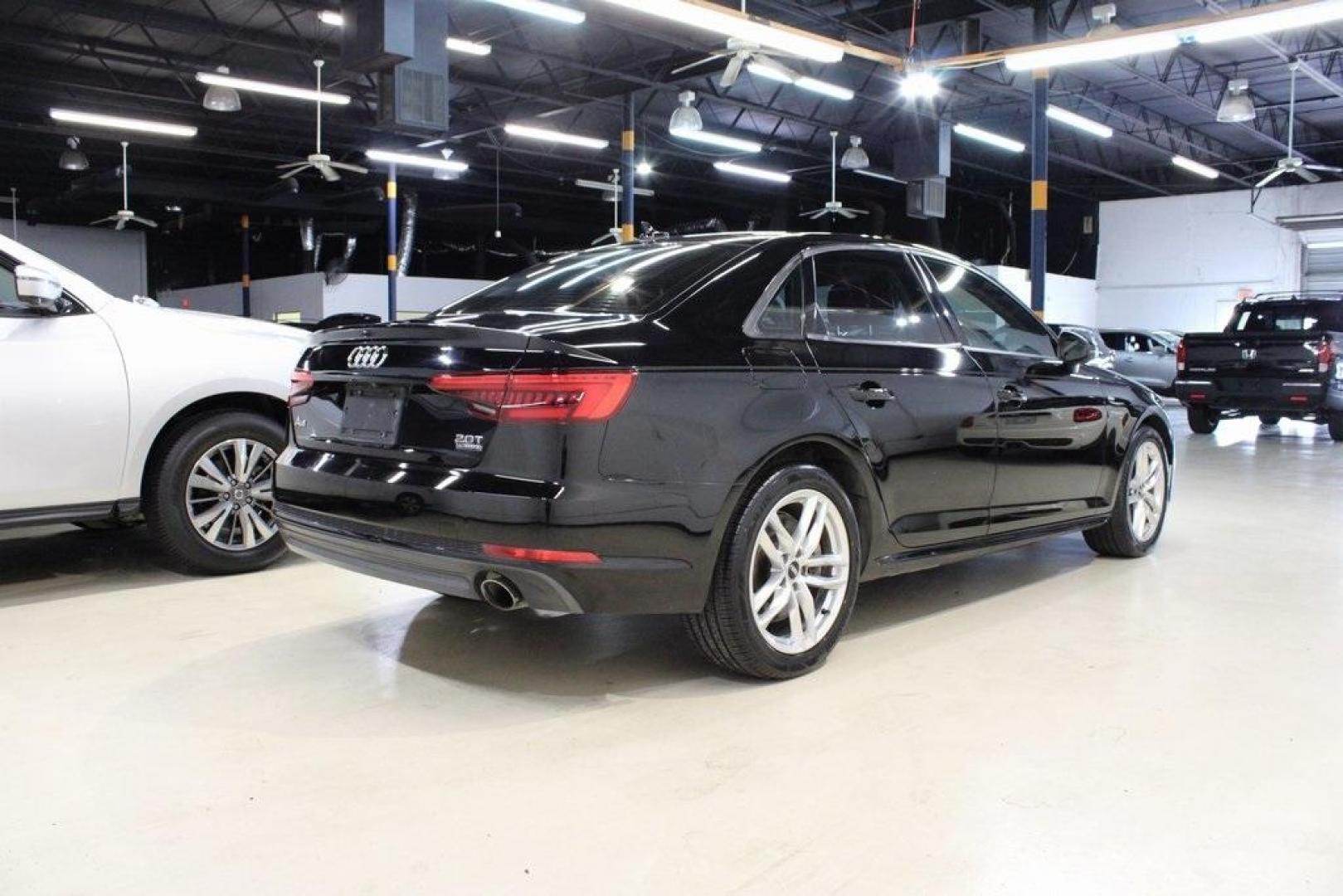 2017 Brilliant Black /Black Audi A4 2.0T (WAUDNAF41HN) with an 2.0L I4 TFSI DOHC engine, Automatic transmission, located at 15300 Midway Rd., Addison, TX, 75001, (972) 702-0011, 32.958321, -96.838074 - Photo#2