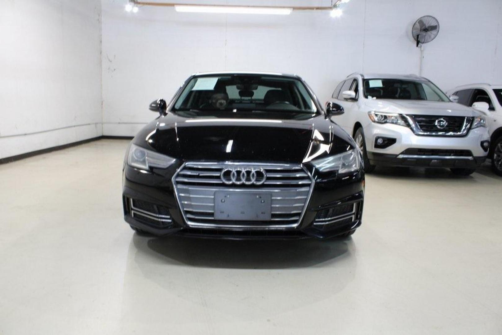 2017 Brilliant Black /Black Audi A4 2.0T (WAUDNAF41HN) with an 2.0L I4 TFSI DOHC engine, Automatic transmission, located at 15300 Midway Rd., Addison, TX, 75001, (972) 702-0011, 32.958321, -96.838074 - Photo#4
