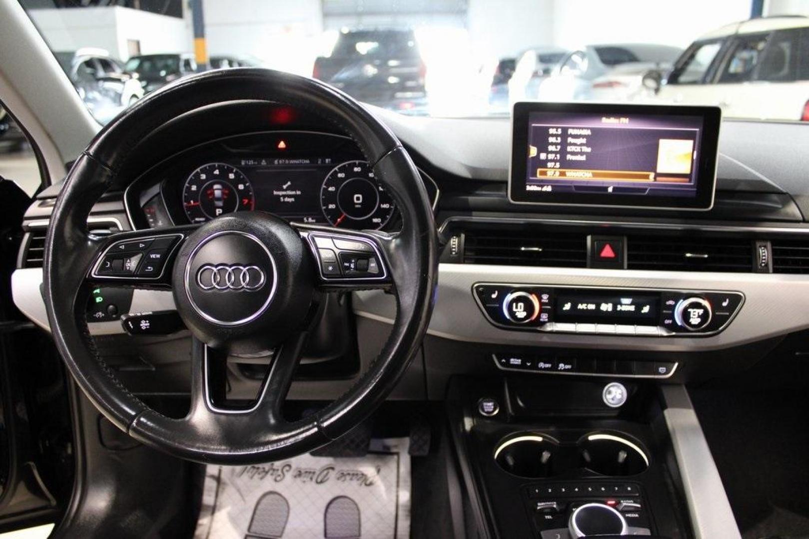 2017 Brilliant Black /Black Audi A4 2.0T (WAUDNAF41HN) with an 2.0L I4 TFSI DOHC engine, Automatic transmission, located at 15300 Midway Rd., Addison, TX, 75001, (972) 702-0011, 32.958321, -96.838074 - Photo#15