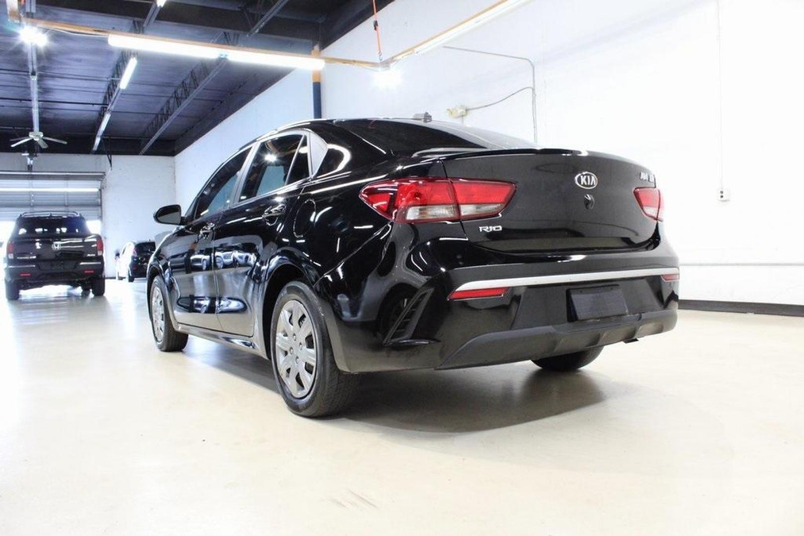 2021 Aurora Black /Black Kia Rio S (3KPA24AD4ME) with an 1.6L 4-Cylinder engine, CVT transmission, located at 15300 Midway Rd., Addison, TX, 75001, (972) 702-0011, 32.958321, -96.838074 - Photo#2