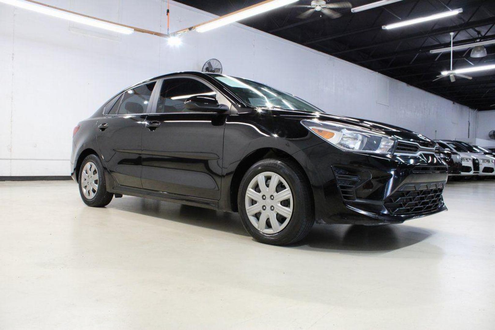 2021 Aurora Black /Black Kia Rio S (3KPA24AD4ME) with an 1.6L 4-Cylinder engine, CVT transmission, located at 15300 Midway Rd., Addison, TX, 75001, (972) 702-0011, 32.958321, -96.838074 - Photo#1