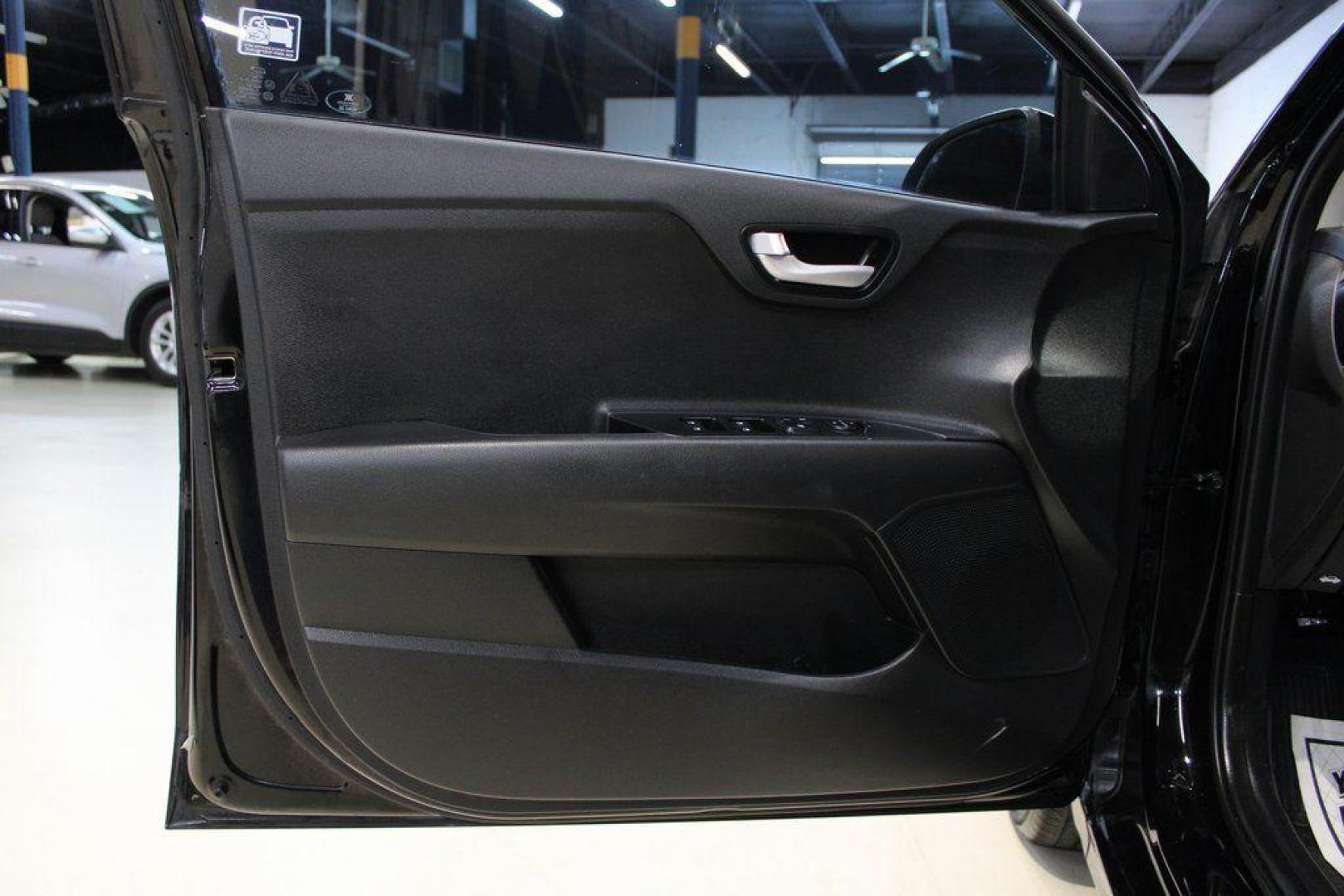 2021 Aurora Black /Black Kia Rio S (3KPA24AD4ME) with an 1.6L 4-Cylinder engine, CVT transmission, located at 15300 Midway Rd., Addison, TX, 75001, (972) 702-0011, 32.958321, -96.838074 - Photo#22