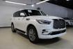 2018 Moonstone White /Graphite INFINITI QX80 Base (JN8AZ2NF0J9) with an 5.6L V8 engine, Automatic transmission, located at 15300 Midway Rd., Addison, TX, 75001, (972) 702-0011, 32.958321, -96.838074 - 2018 INFINITI QX80<br><br>Now Available at Midway Auto Group, Addison, Texas<br><br>Bold, luxurious, and built for families who want full-size capability with premium comfort, the 2018 INFINITI QX80 stands at the top of the luxury SUV segment. With powerful V8 performance, a commanding road presence - Photo#1