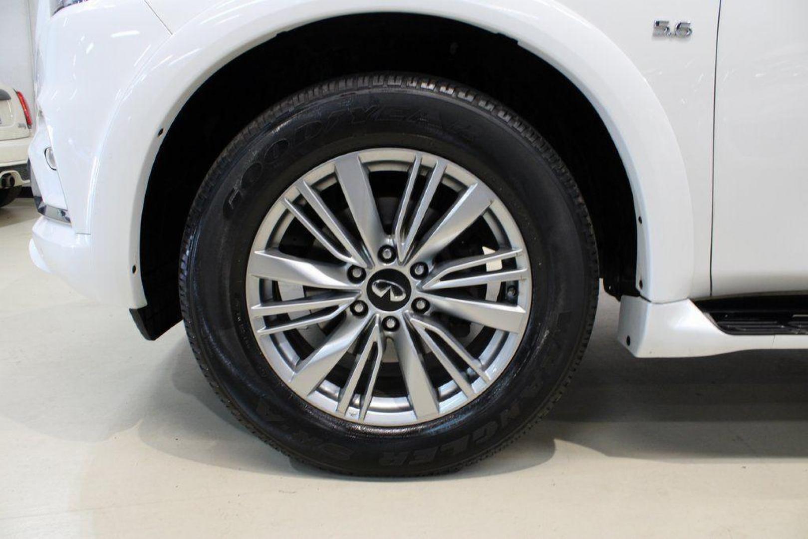 2018 Moonstone White /Graphite INFINITI QX80 Base (JN8AZ2NF0J9) with an 5.6L V8 engine, Automatic transmission, located at 15300 Midway Rd., Addison, TX, 75001, (972) 702-0011, 32.958321, -96.838074 - 2018 INFINITI QX80<br><br>Now Available at Midway Auto Group, Addison, Texas<br><br>Bold, luxurious, and built for families who want full-size capability with premium comfort, the 2018 INFINITI QX80 stands at the top of the luxury SUV segment. With powerful V8 performance, a commanding road presence - Photo#8