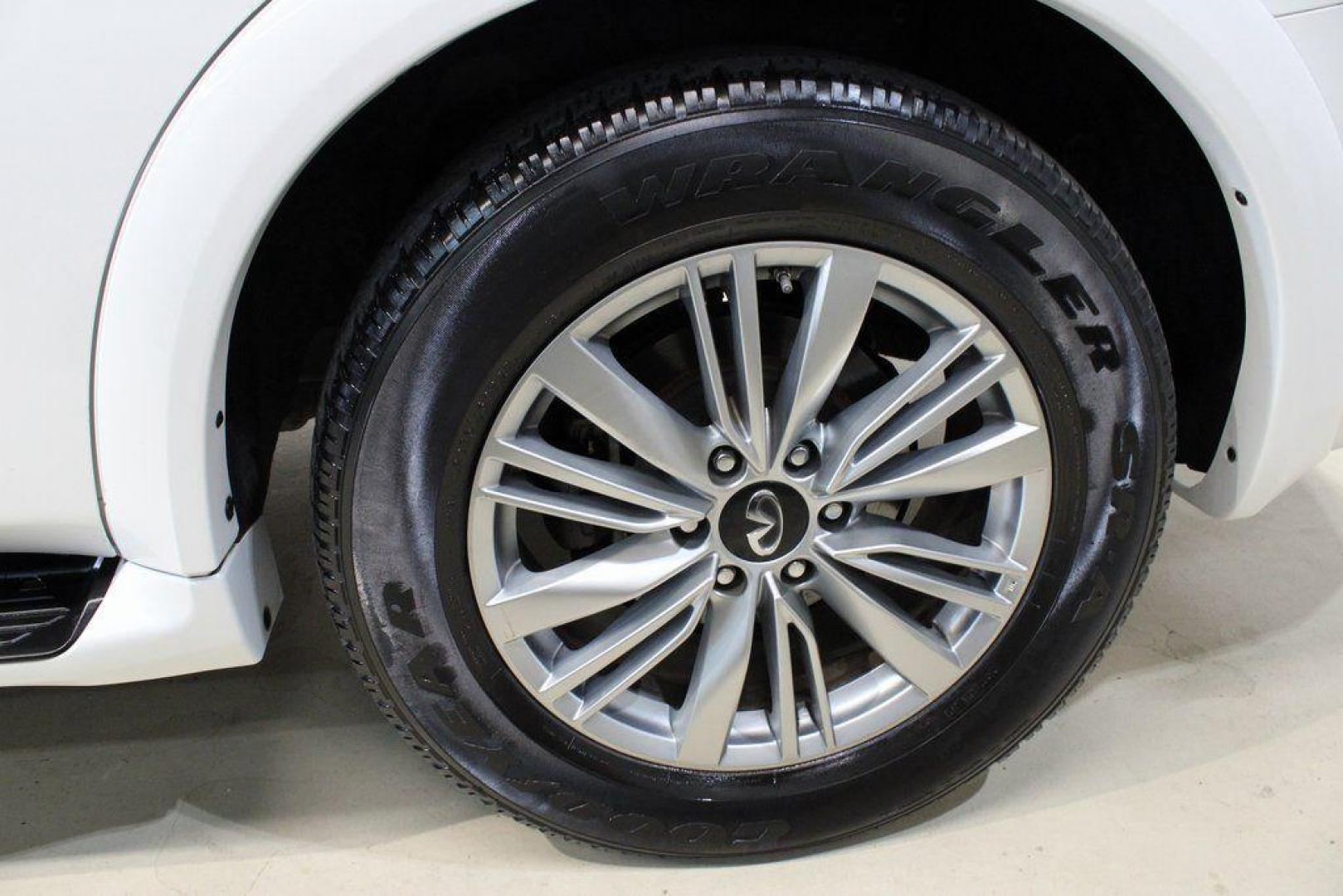 2018 Moonstone White /Graphite INFINITI QX80 Base (JN8AZ2NF0J9) with an 5.6L V8 engine, Automatic transmission, located at 15300 Midway Rd., Addison, TX, 75001, (972) 702-0011, 32.958321, -96.838074 - 2018 INFINITI QX80<br><br>Now Available at Midway Auto Group, Addison, Texas<br><br>Bold, luxurious, and built for families who want full-size capability with premium comfort, the 2018 INFINITI QX80 stands at the top of the luxury SUV segment. With powerful V8 performance, a commanding road presence - Photo#9