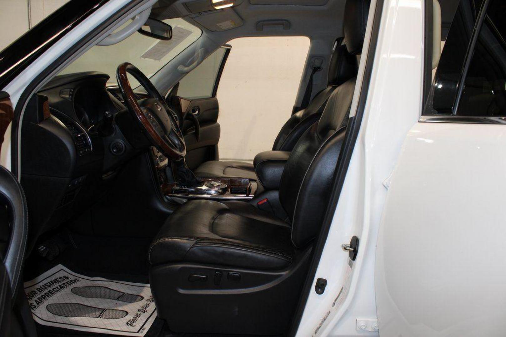 2018 Moonstone White /Graphite INFINITI QX80 Base (JN8AZ2NF0J9) with an 5.6L V8 engine, Automatic transmission, located at 15300 Midway Rd., Addison, TX, 75001, (972) 702-0011, 32.958321, -96.838074 - 2018 INFINITI QX80<br><br>Now Available at Midway Auto Group, Addison, Texas<br><br>Bold, luxurious, and built for families who want full-size capability with premium comfort, the 2018 INFINITI QX80 stands at the top of the luxury SUV segment. With powerful V8 performance, a commanding road presence - Photo#13