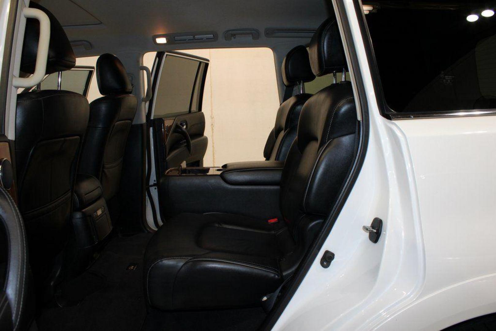 2018 Moonstone White /Graphite INFINITI QX80 Base (JN8AZ2NF0J9) with an 5.6L V8 engine, Automatic transmission, located at 15300 Midway Rd., Addison, TX, 75001, (972) 702-0011, 32.958321, -96.838074 - 2018 INFINITI QX80<br><br>Now Available at Midway Auto Group, Addison, Texas<br><br>Bold, luxurious, and built for families who want full-size capability with premium comfort, the 2018 INFINITI QX80 stands at the top of the luxury SUV segment. With powerful V8 performance, a commanding road presence - Photo#16