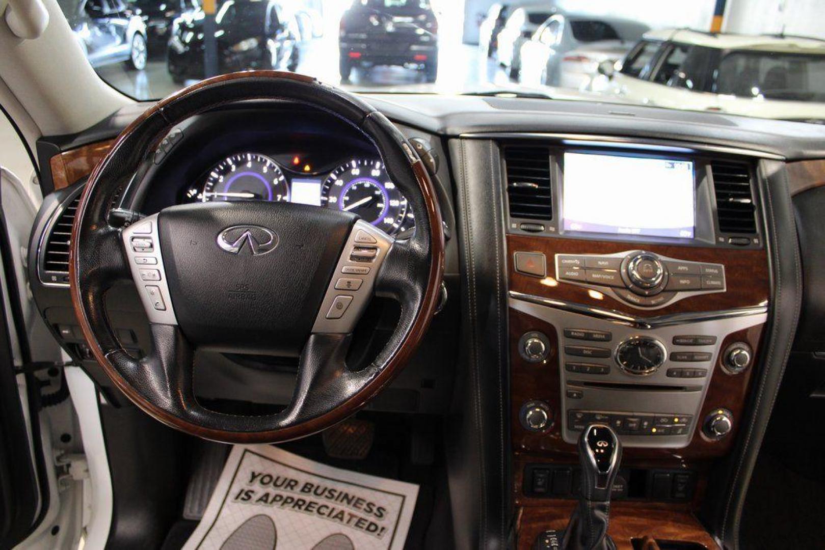 2018 Moonstone White /Graphite INFINITI QX80 Base (JN8AZ2NF0J9) with an 5.6L V8 engine, Automatic transmission, located at 15300 Midway Rd., Addison, TX, 75001, (972) 702-0011, 32.958321, -96.838074 - 2018 INFINITI QX80<br><br>Now Available at Midway Auto Group, Addison, Texas<br><br>Bold, luxurious, and built for families who want full-size capability with premium comfort, the 2018 INFINITI QX80 stands at the top of the luxury SUV segment. With powerful V8 performance, a commanding road presence - Photo#18