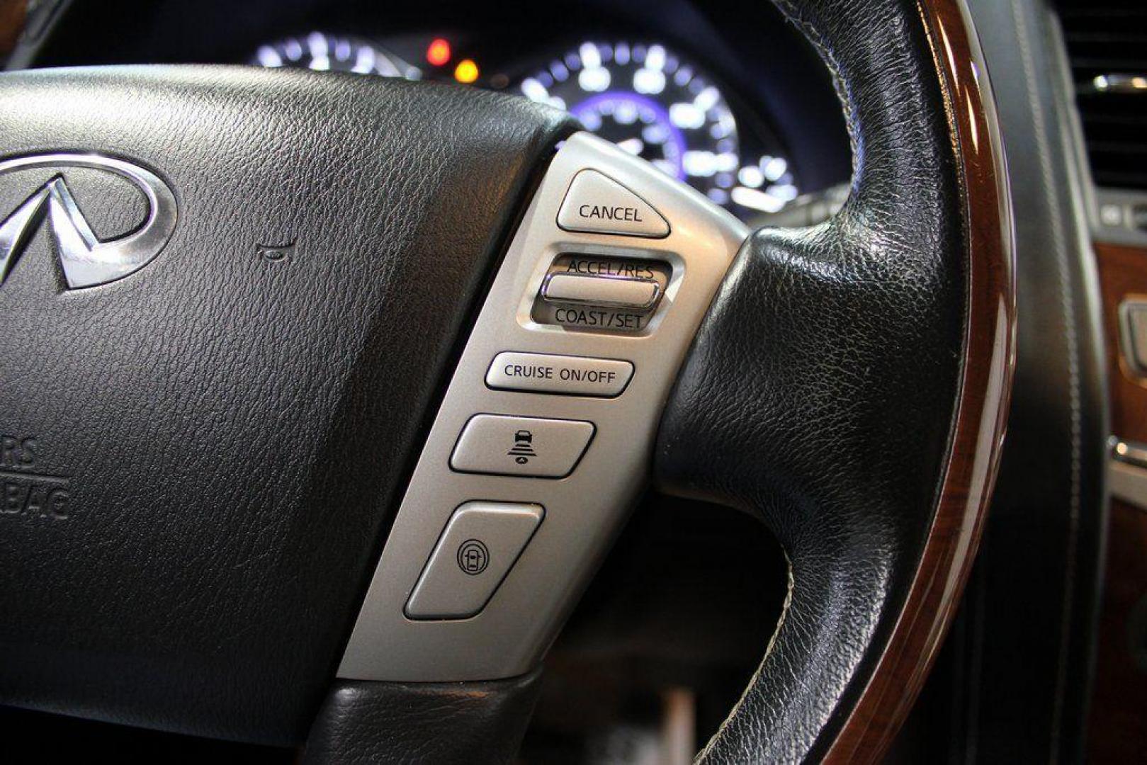 2018 Moonstone White /Graphite INFINITI QX80 Base (JN8AZ2NF0J9) with an 5.6L V8 engine, Automatic transmission, located at 15300 Midway Rd., Addison, TX, 75001, (972) 702-0011, 32.958321, -96.838074 - 2018 INFINITI QX80<br><br>Now Available at Midway Auto Group, Addison, Texas<br><br>Bold, luxurious, and built for families who want full-size capability with premium comfort, the 2018 INFINITI QX80 stands at the top of the luxury SUV segment. With powerful V8 performance, a commanding road presence - Photo#27