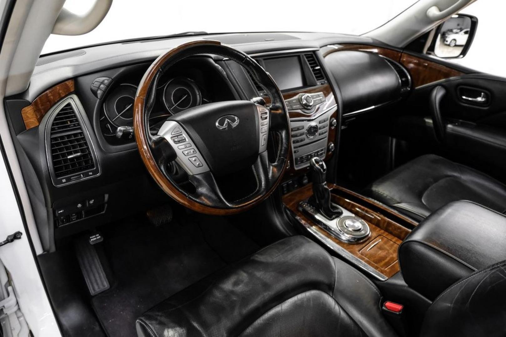 2018 Moonstone /Graphite INFINITI QX80 Base (JN8AZ2NF0J9) with an 5.6L V8 engine, Automatic transmission, located at 15300 Midway Rd., Addison, TX, 75001, (972) 702-0011, 32.958321, -96.838074 - 2018 INFINITI QX80<br><br>Now Available at Midway Auto Group, Addison, Texas<br><br>Bold, luxurious, and built for families who want full-size capability with premium comfort, the 2018 INFINITI QX80 stands at the top of the luxury SUV segment. With powerful V8 performance, a commanding road presence - Photo#2