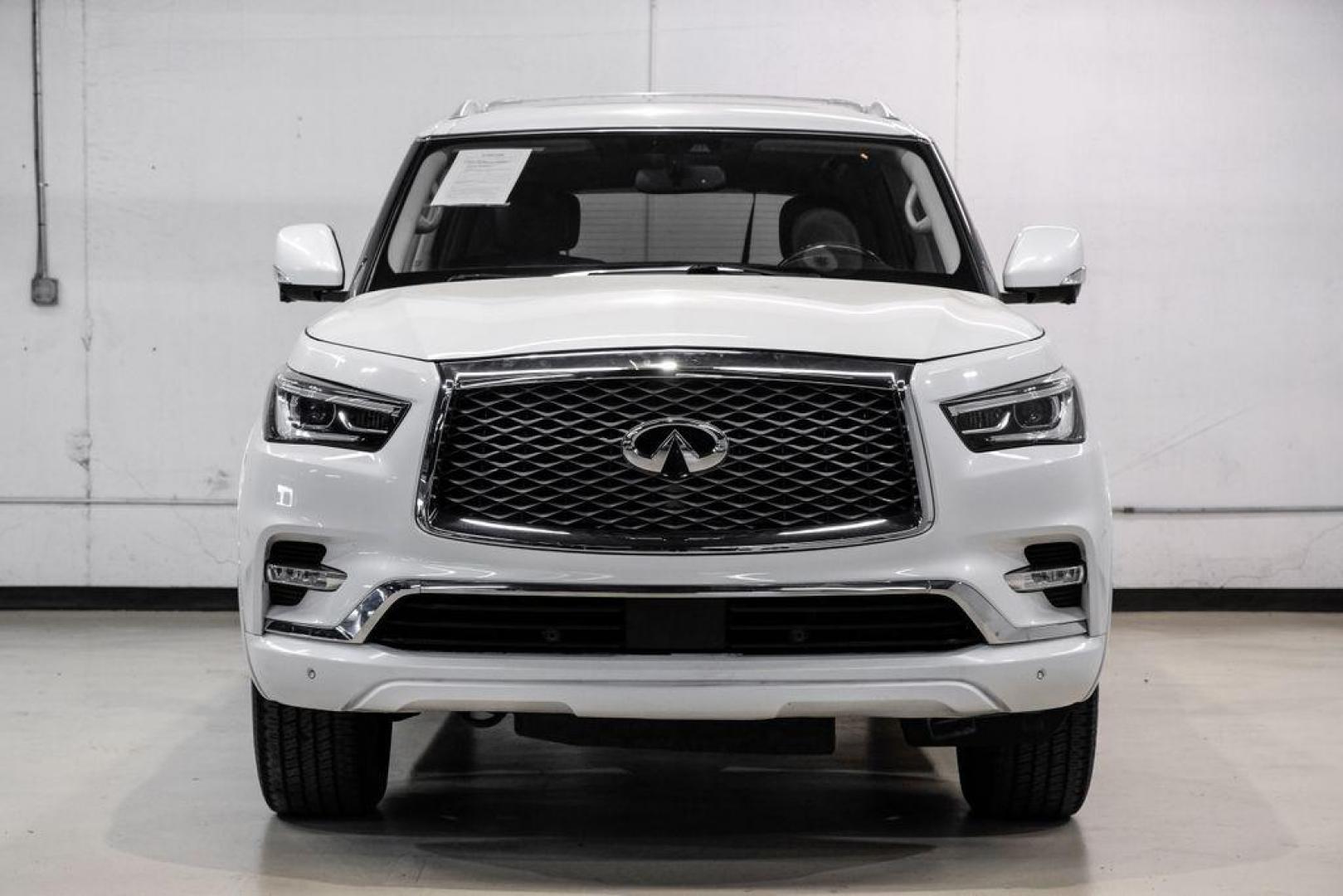 2018 Moonstone /Graphite INFINITI QX80 Base (JN8AZ2NF0J9) with an 5.6L V8 engine, Automatic transmission, located at 15300 Midway Rd., Addison, TX, 75001, (972) 702-0011, 32.958321, -96.838074 - 2018 INFINITI QX80<br><br>Now Available at Midway Auto Group, Addison, Texas<br><br>Bold, luxurious, and built for families who want full-size capability with premium comfort, the 2018 INFINITI QX80 stands at the top of the luxury SUV segment. With powerful V8 performance, a commanding road presence - Photo#5