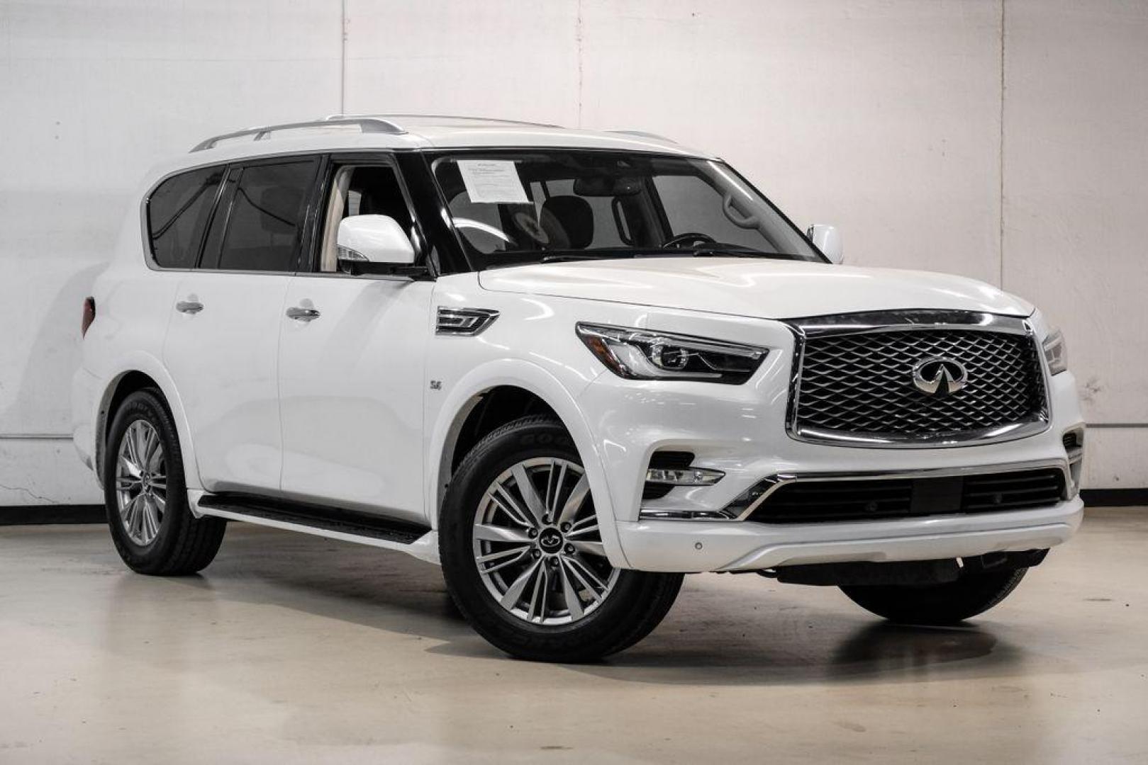 2018 Moonstone /Graphite INFINITI QX80 Base (JN8AZ2NF0J9) with an 5.6L V8 engine, Automatic transmission, located at 15300 Midway Rd., Addison, TX, 75001, (972) 702-0011, 32.958321, -96.838074 - 2018 INFINITI QX80<br><br>Now Available at Midway Auto Group, Addison, Texas<br><br>Bold, luxurious, and built for families who want full-size capability with premium comfort, the 2018 INFINITI QX80 stands at the top of the luxury SUV segment. With powerful V8 performance, a commanding road presence - Photo#6