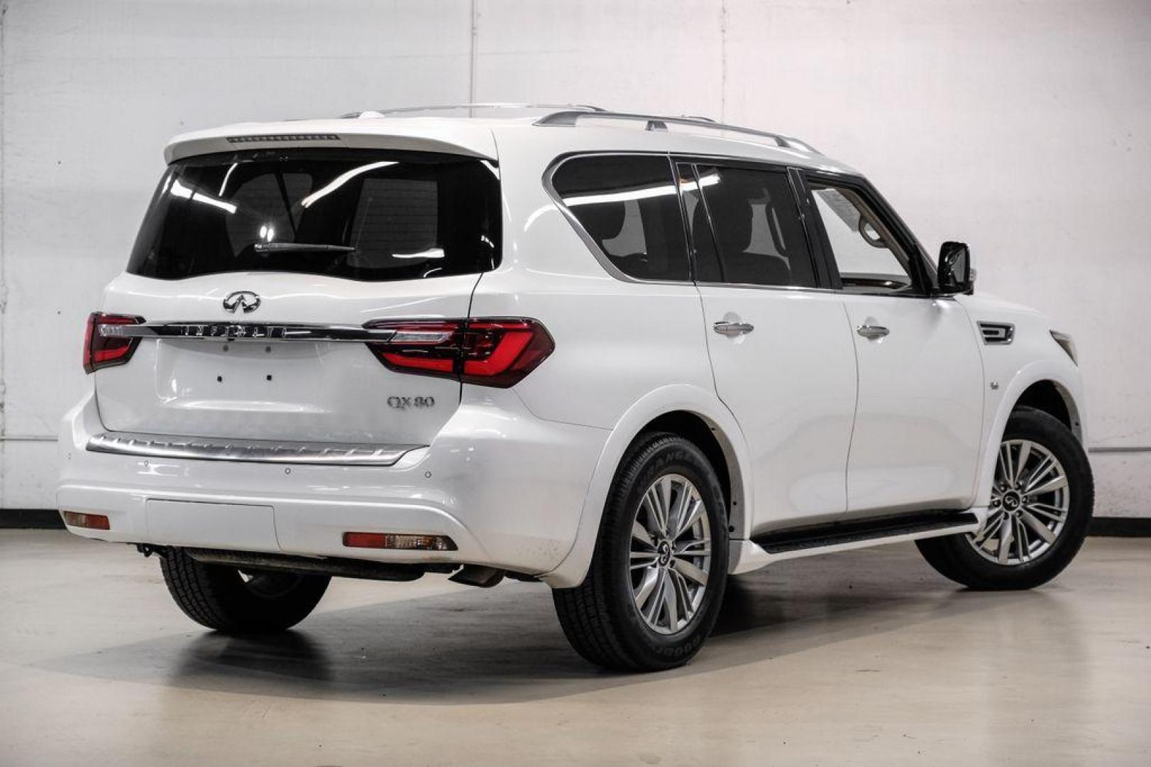 2018 Moonstone /Graphite INFINITI QX80 Base (JN8AZ2NF0J9) with an 5.6L V8 engine, Automatic transmission, located at 15300 Midway Rd., Addison, TX, 75001, (972) 702-0011, 32.958321, -96.838074 - 2018 INFINITI QX80<br><br>Now Available at Midway Auto Group, Addison, Texas<br><br>Bold, luxurious, and built for families who want full-size capability with premium comfort, the 2018 INFINITI QX80 stands at the top of the luxury SUV segment. With powerful V8 performance, a commanding road presence - Photo#7