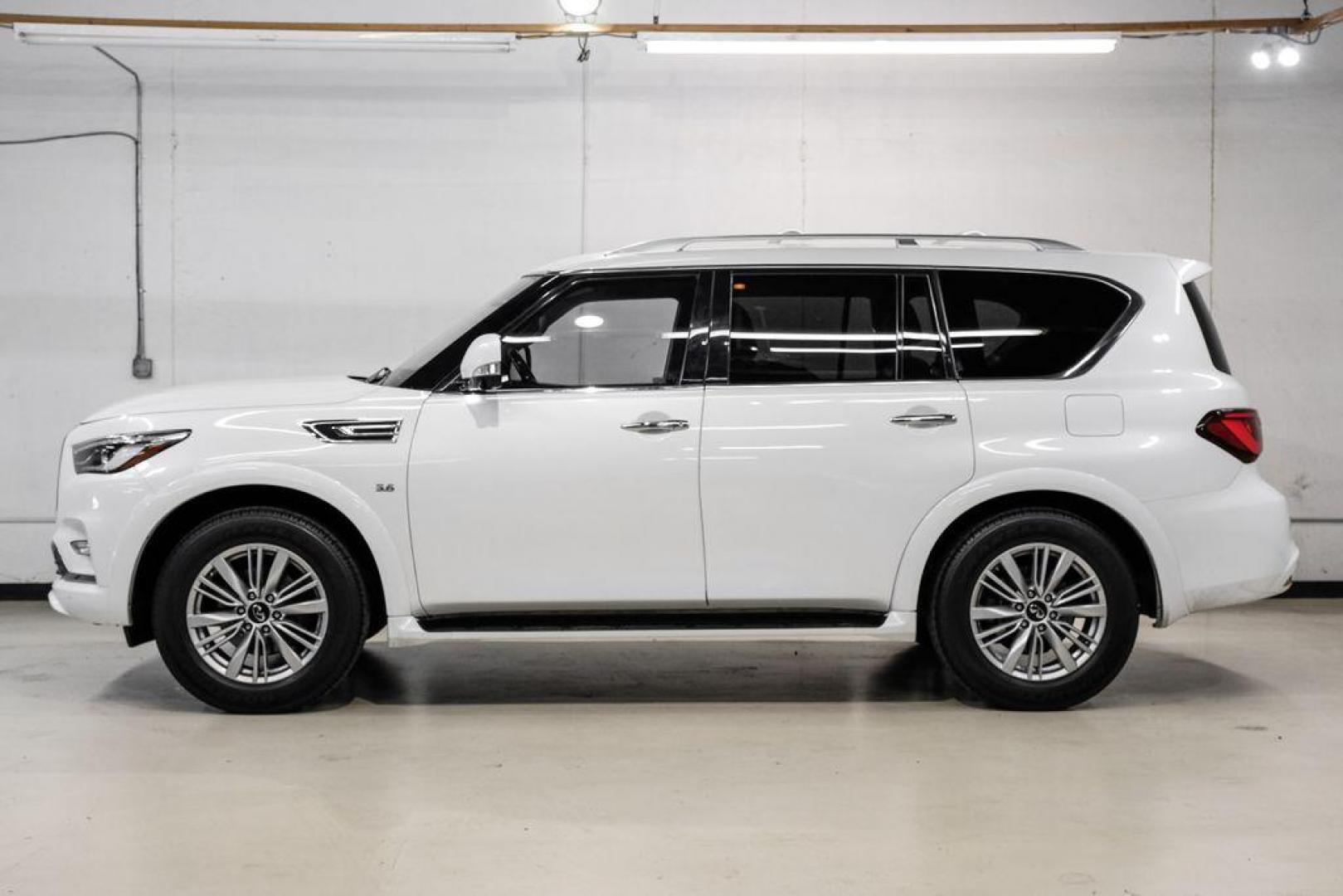 2018 Moonstone /Graphite INFINITI QX80 Base (JN8AZ2NF0J9) with an 5.6L V8 engine, Automatic transmission, located at 15300 Midway Rd., Addison, TX, 75001, (972) 702-0011, 32.958321, -96.838074 - 2018 INFINITI QX80<br><br>Now Available at Midway Auto Group, Addison, Texas<br><br>Bold, luxurious, and built for families who want full-size capability with premium comfort, the 2018 INFINITI QX80 stands at the top of the luxury SUV segment. With powerful V8 performance, a commanding road presence - Photo#10