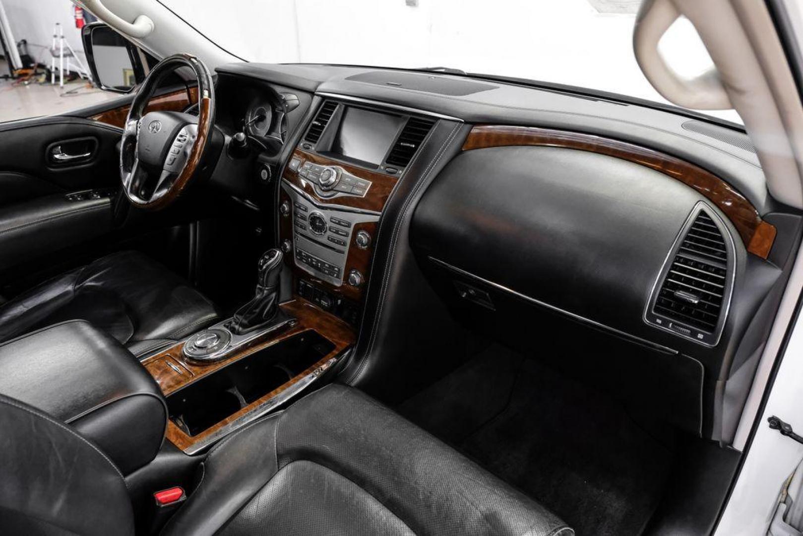 2018 Moonstone /Graphite INFINITI QX80 Base (JN8AZ2NF0J9) with an 5.6L V8 engine, Automatic transmission, located at 15300 Midway Rd., Addison, TX, 75001, (972) 702-0011, 32.958321, -96.838074 - 2018 INFINITI QX80<br><br>Now Available at Midway Auto Group, Addison, Texas<br><br>Bold, luxurious, and built for families who want full-size capability with premium comfort, the 2018 INFINITI QX80 stands at the top of the luxury SUV segment. With powerful V8 performance, a commanding road presence - Photo#11