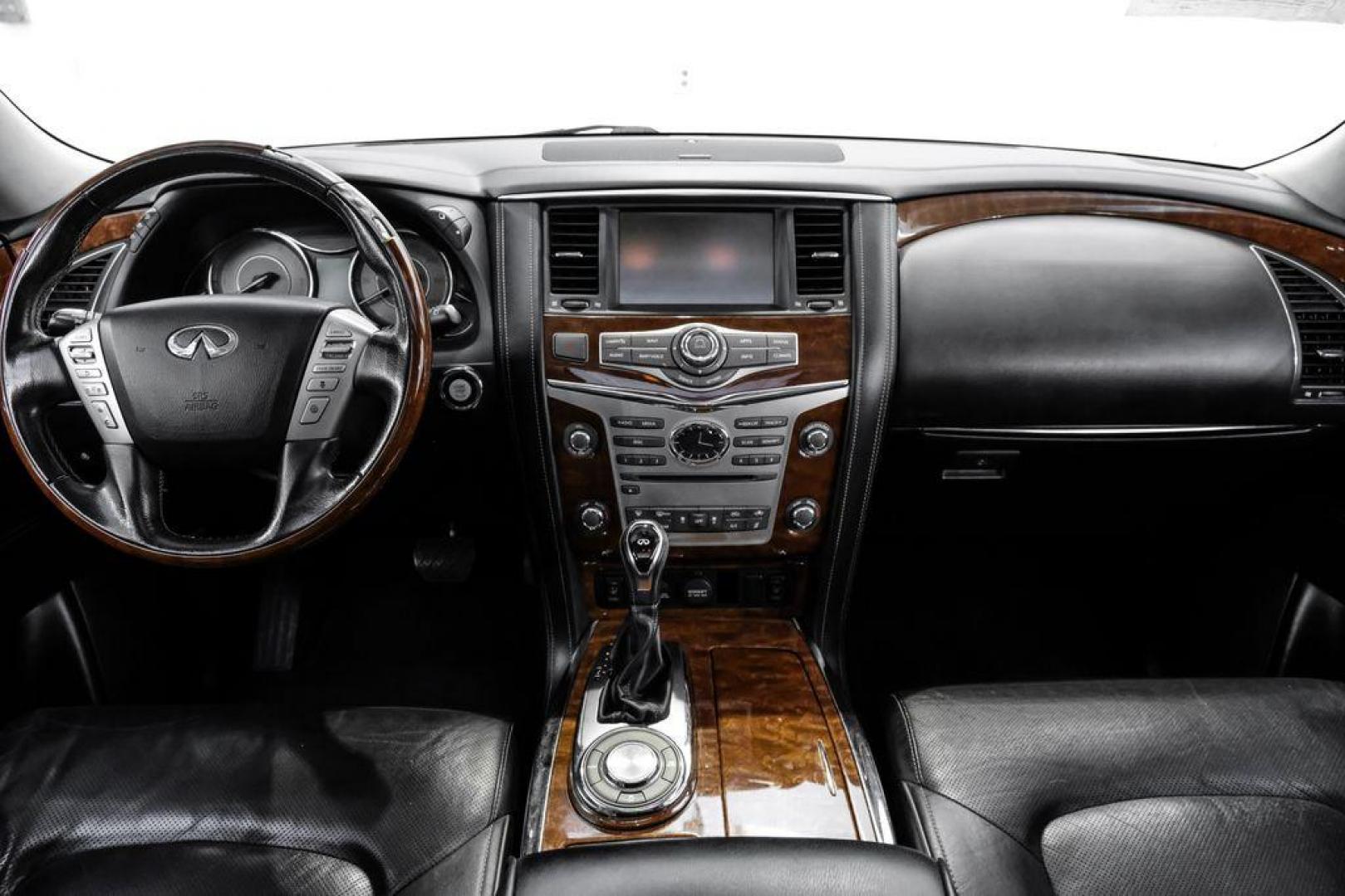 2018 Moonstone /Graphite INFINITI QX80 Base (JN8AZ2NF0J9) with an 5.6L V8 engine, Automatic transmission, located at 15300 Midway Rd., Addison, TX, 75001, (972) 702-0011, 32.958321, -96.838074 - 2018 INFINITI QX80<br><br>Now Available at Midway Auto Group, Addison, Texas<br><br>Bold, luxurious, and built for families who want full-size capability with premium comfort, the 2018 INFINITI QX80 stands at the top of the luxury SUV segment. With powerful V8 performance, a commanding road presence - Photo#12