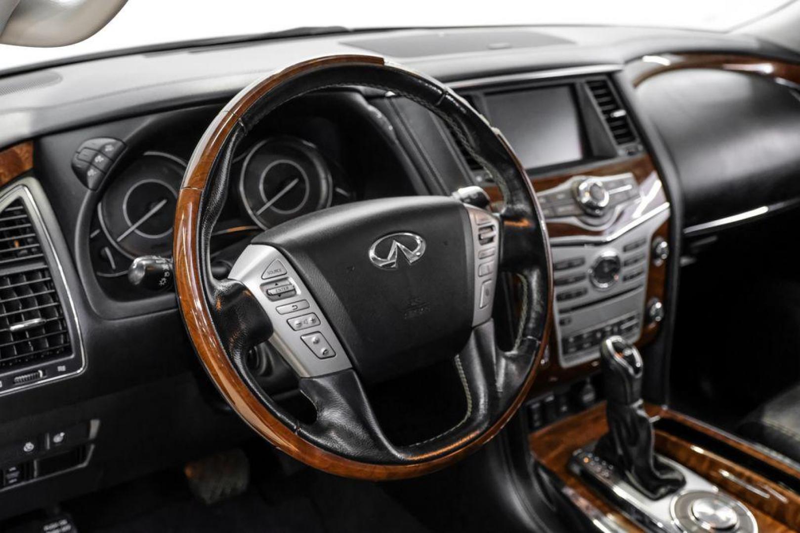 2018 Moonstone /Graphite INFINITI QX80 Base (JN8AZ2NF0J9) with an 5.6L V8 engine, Automatic transmission, located at 15300 Midway Rd., Addison, TX, 75001, (972) 702-0011, 32.958321, -96.838074 - 2018 INFINITI QX80<br><br>Now Available at Midway Auto Group, Addison, Texas<br><br>Bold, luxurious, and built for families who want full-size capability with premium comfort, the 2018 INFINITI QX80 stands at the top of the luxury SUV segment. With powerful V8 performance, a commanding road presence - Photo#14