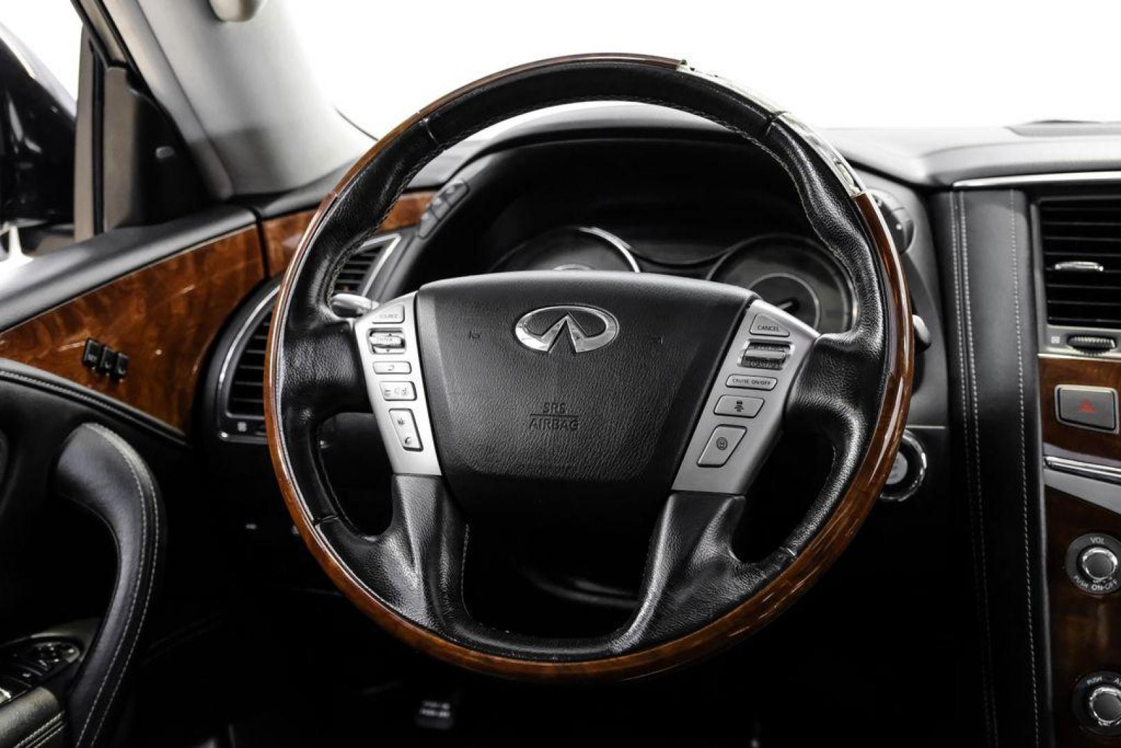 2018 Moonstone /Graphite INFINITI QX80 Base (JN8AZ2NF0J9) with an 5.6L V8 engine, Automatic transmission, located at 15300 Midway Rd., Addison, TX, 75001, (972) 702-0011, 32.958321, -96.838074 - 2018 INFINITI QX80<br><br>Now Available at Midway Auto Group, Addison, Texas<br><br>Bold, luxurious, and built for families who want full-size capability with premium comfort, the 2018 INFINITI QX80 stands at the top of the luxury SUV segment. With powerful V8 performance, a commanding road presence - Photo#15