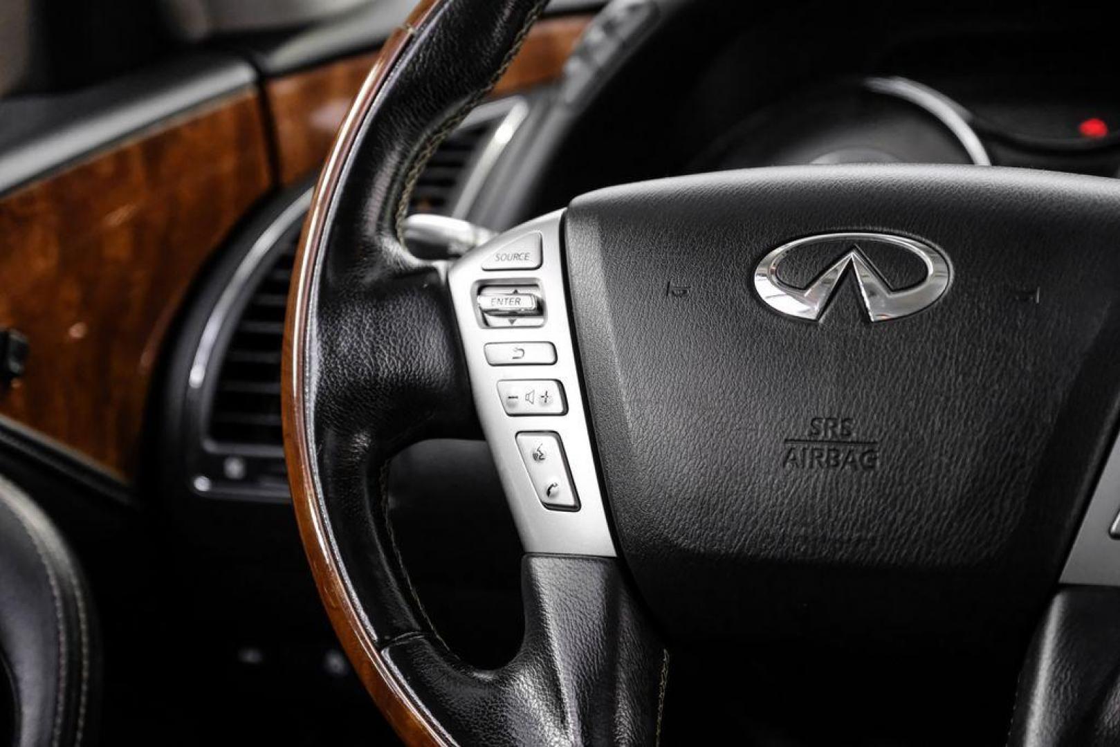 2018 Moonstone /Graphite INFINITI QX80 Base (JN8AZ2NF0J9) with an 5.6L V8 engine, Automatic transmission, located at 15300 Midway Rd., Addison, TX, 75001, (972) 702-0011, 32.958321, -96.838074 - 2018 INFINITI QX80<br><br>Now Available at Midway Auto Group, Addison, Texas<br><br>Bold, luxurious, and built for families who want full-size capability with premium comfort, the 2018 INFINITI QX80 stands at the top of the luxury SUV segment. With powerful V8 performance, a commanding road presence - Photo#16