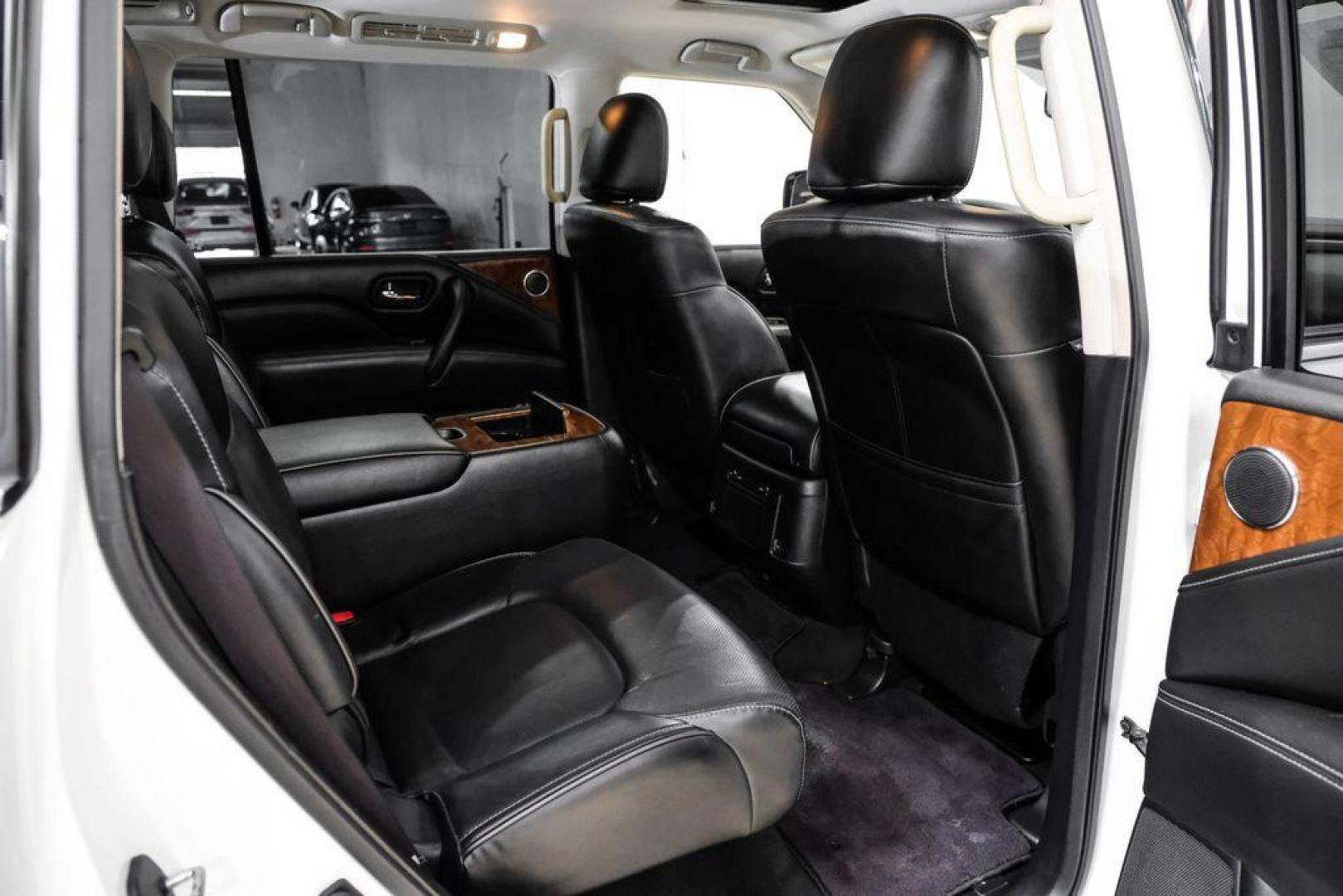 2018 Moonstone /Graphite INFINITI QX80 Base (JN8AZ2NF0J9) with an 5.6L V8 engine, Automatic transmission, located at 15300 Midway Rd., Addison, TX, 75001, (972) 702-0011, 32.958321, -96.838074 - 2018 INFINITI QX80<br><br>Now Available at Midway Auto Group, Addison, Texas<br><br>Bold, luxurious, and built for families who want full-size capability with premium comfort, the 2018 INFINITI QX80 stands at the top of the luxury SUV segment. With powerful V8 performance, a commanding road presence - Photo#33