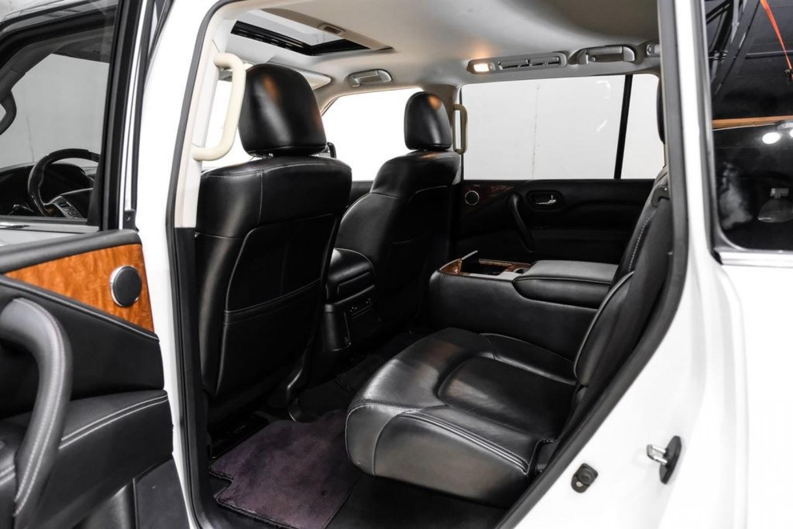 2018 Moonstone /Graphite INFINITI QX80 Base (JN8AZ2NF0J9) with an 5.6L V8 engine, Automatic transmission, located at 15300 Midway Rd., Addison, TX, 75001, (972) 702-0011, 32.958321, -96.838074 - 2018 INFINITI QX80<br><br>Now Available at Midway Auto Group, Addison, Texas<br><br>Bold, luxurious, and built for families who want full-size capability with premium comfort, the 2018 INFINITI QX80 stands at the top of the luxury SUV segment. With powerful V8 performance, a commanding road presence - Photo#34