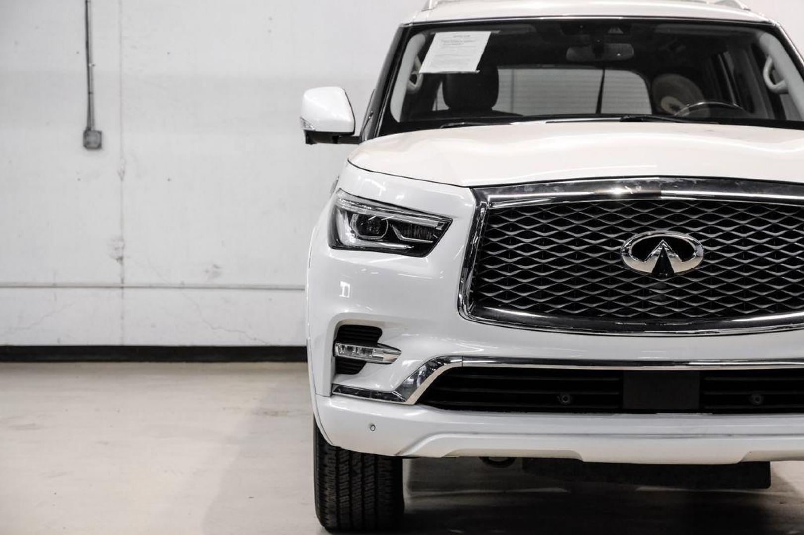 2018 Moonstone /Graphite INFINITI QX80 Base (JN8AZ2NF0J9) with an 5.6L V8 engine, Automatic transmission, located at 15300 Midway Rd., Addison, TX, 75001, (972) 702-0011, 32.958321, -96.838074 - 2018 INFINITI QX80<br><br>Now Available at Midway Auto Group, Addison, Texas<br><br>Bold, luxurious, and built for families who want full-size capability with premium comfort, the 2018 INFINITI QX80 stands at the top of the luxury SUV segment. With powerful V8 performance, a commanding road presence - Photo#42