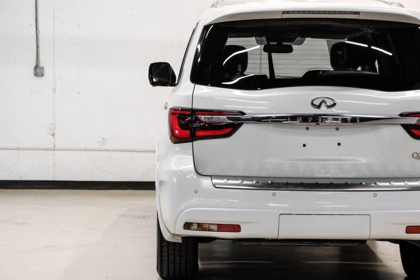2018 Moonstone /Graphite INFINITI QX80 Base (JN8AZ2NF0J9) with an 5.6L V8 engine, Automatic transmission, located at 15300 Midway Rd., Addison, TX, 75001, (972) 702-0011, 32.958321, -96.838074 - 2018 INFINITI QX80<br><br>Now Available at Midway Auto Group, Addison, Texas<br><br>Bold, luxurious, and built for families who want full-size capability with premium comfort, the 2018 INFINITI QX80 stands at the top of the luxury SUV segment. With powerful V8 performance, a commanding road presence - Photo#43