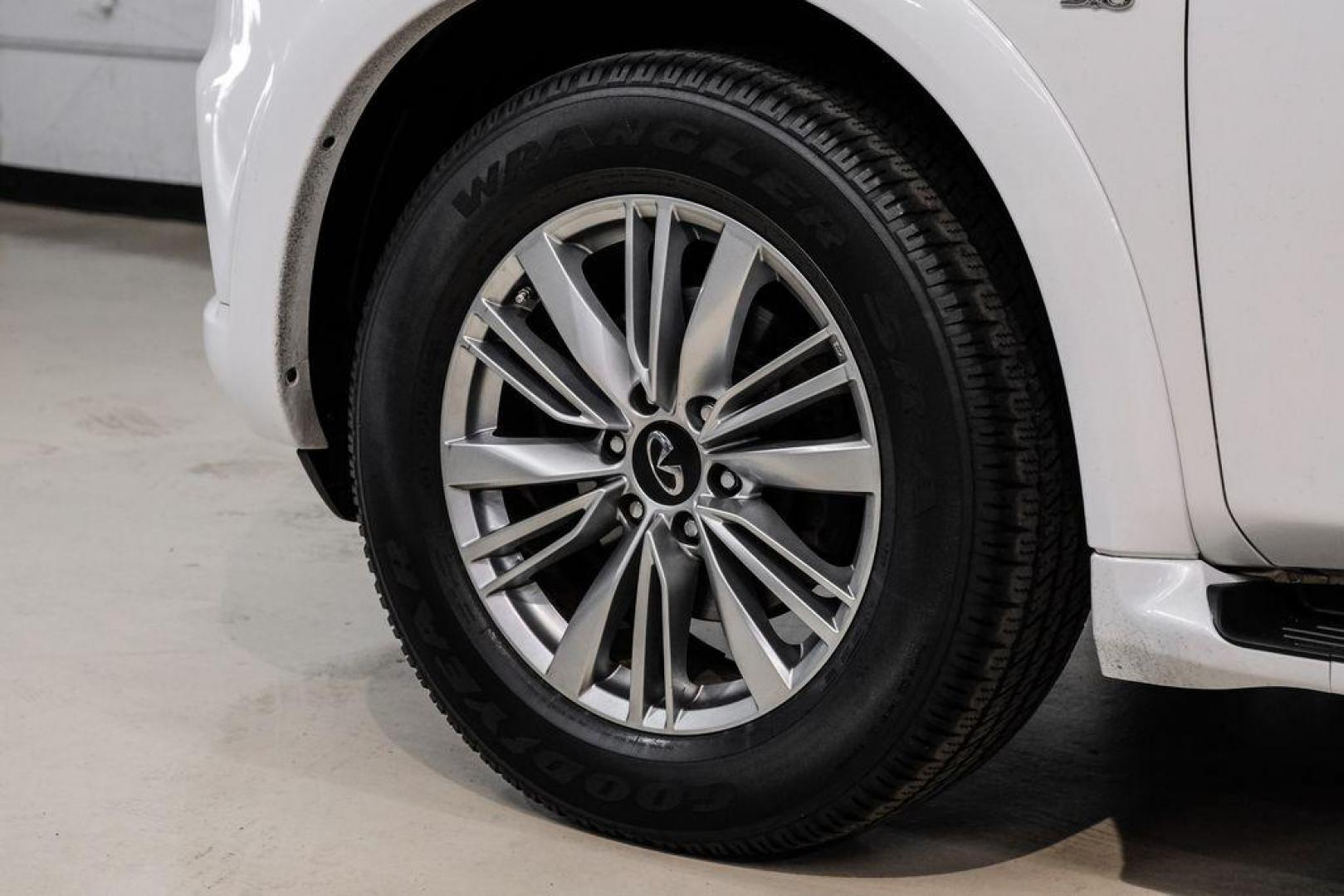 2018 Moonstone /Graphite INFINITI QX80 Base (JN8AZ2NF0J9) with an 5.6L V8 engine, Automatic transmission, located at 15300 Midway Rd., Addison, TX, 75001, (972) 702-0011, 32.958321, -96.838074 - 2018 INFINITI QX80<br><br>Now Available at Midway Auto Group, Addison, Texas<br><br>Bold, luxurious, and built for families who want full-size capability with premium comfort, the 2018 INFINITI QX80 stands at the top of the luxury SUV segment. With powerful V8 performance, a commanding road presence - Photo#49