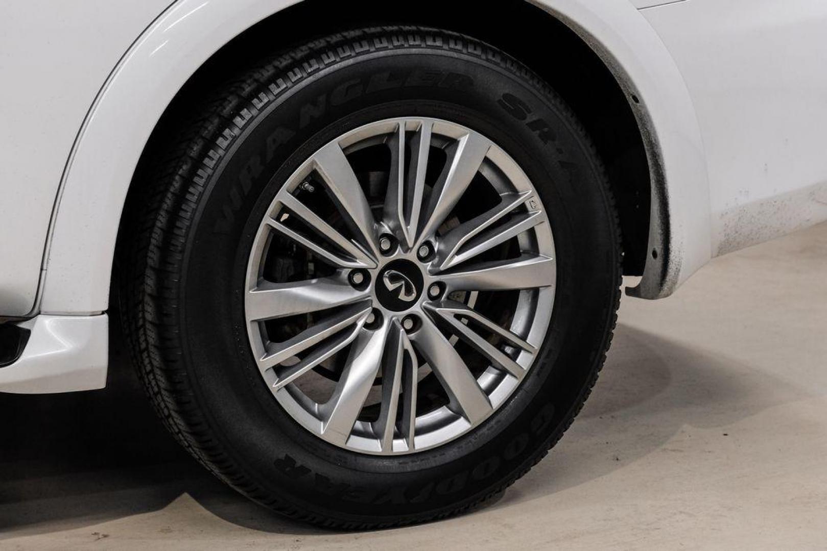 2018 Moonstone /Graphite INFINITI QX80 Base (JN8AZ2NF0J9) with an 5.6L V8 engine, Automatic transmission, located at 15300 Midway Rd., Addison, TX, 75001, (972) 702-0011, 32.958321, -96.838074 - 2018 INFINITI QX80<br><br>Now Available at Midway Auto Group, Addison, Texas<br><br>Bold, luxurious, and built for families who want full-size capability with premium comfort, the 2018 INFINITI QX80 stands at the top of the luxury SUV segment. With powerful V8 performance, a commanding road presence - Photo#50