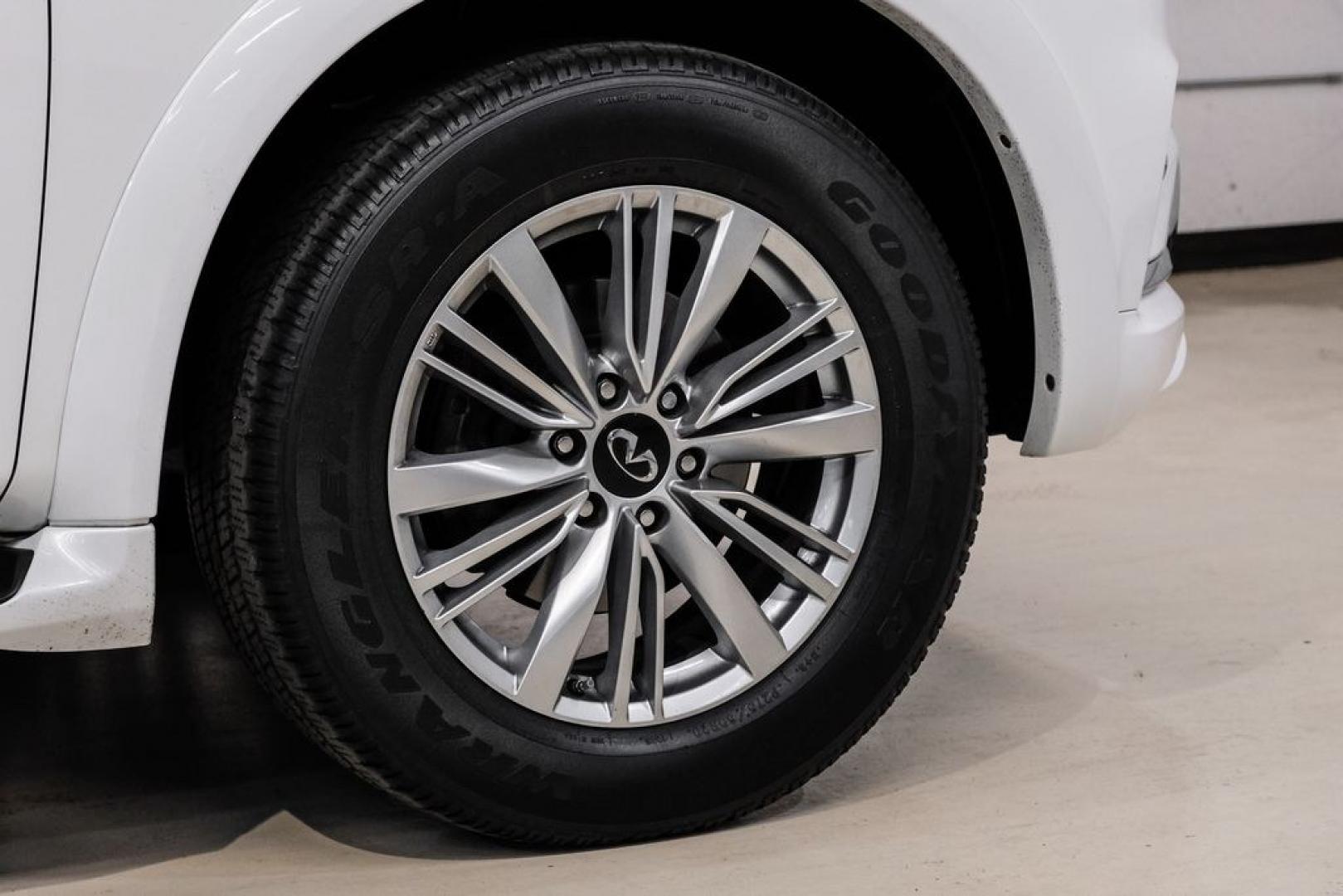 2018 Moonstone /Graphite INFINITI QX80 Base (JN8AZ2NF0J9) with an 5.6L V8 engine, Automatic transmission, located at 15300 Midway Rd., Addison, TX, 75001, (972) 702-0011, 32.958321, -96.838074 - 2018 INFINITI QX80<br><br>Now Available at Midway Auto Group, Addison, Texas<br><br>Bold, luxurious, and built for families who want full-size capability with premium comfort, the 2018 INFINITI QX80 stands at the top of the luxury SUV segment. With powerful V8 performance, a commanding road presence - Photo#52