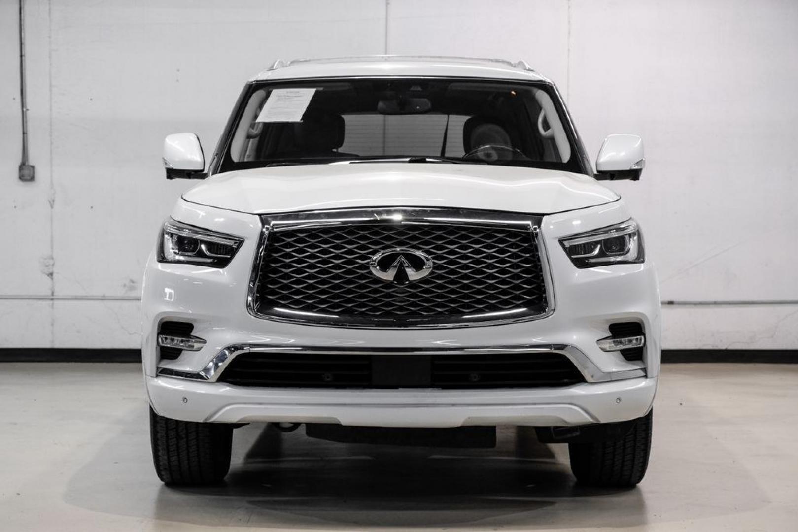 2018 Moonstone /Graphite INFINITI QX80 Base (JN8AZ2NF0J9) with an 5.6L V8 engine, Automatic transmission, located at 15300 Midway Rd., Addison, TX, 75001, (972) 702-0011, 32.958321, -96.838074 - 2018 INFINITI QX80<br><br>Now Available at Midway Auto Group, Addison, Texas<br><br>Bold, luxurious, and built for families who want full-size capability with premium comfort, the 2018 INFINITI QX80 stands at the top of the luxury SUV segment. With powerful V8 performance, a commanding road presence- Photo#5