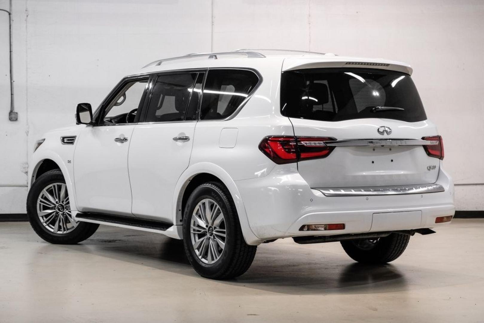 2018 Moonstone /Graphite INFINITI QX80 Base (JN8AZ2NF0J9) with an 5.6L V8 engine, Automatic transmission, located at 15300 Midway Rd., Addison, TX, 75001, (972) 702-0011, 32.958321, -96.838074 - 2018 INFINITI QX80<br><br>Now Available at Midway Auto Group, Addison, Texas<br><br>Bold, luxurious, and built for families who want full-size capability with premium comfort, the 2018 INFINITI QX80 stands at the top of the luxury SUV segment. With powerful V8 performance, a commanding road presence- Photo#9