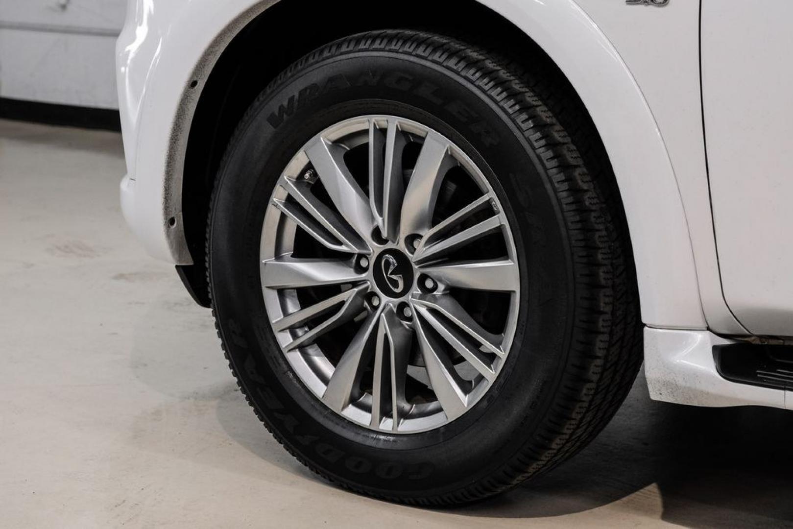 2018 Moonstone /Graphite INFINITI QX80 Base (JN8AZ2NF0J9) with an 5.6L V8 engine, Automatic transmission, located at 15300 Midway Rd., Addison, TX, 75001, (972) 702-0011, 32.958321, -96.838074 - 2018 INFINITI QX80<br><br>Now Available at Midway Auto Group, Addison, Texas<br><br>Bold, luxurious, and built for families who want full-size capability with premium comfort, the 2018 INFINITI QX80 stands at the top of the luxury SUV segment. With powerful V8 performance, a commanding road presence- Photo#49