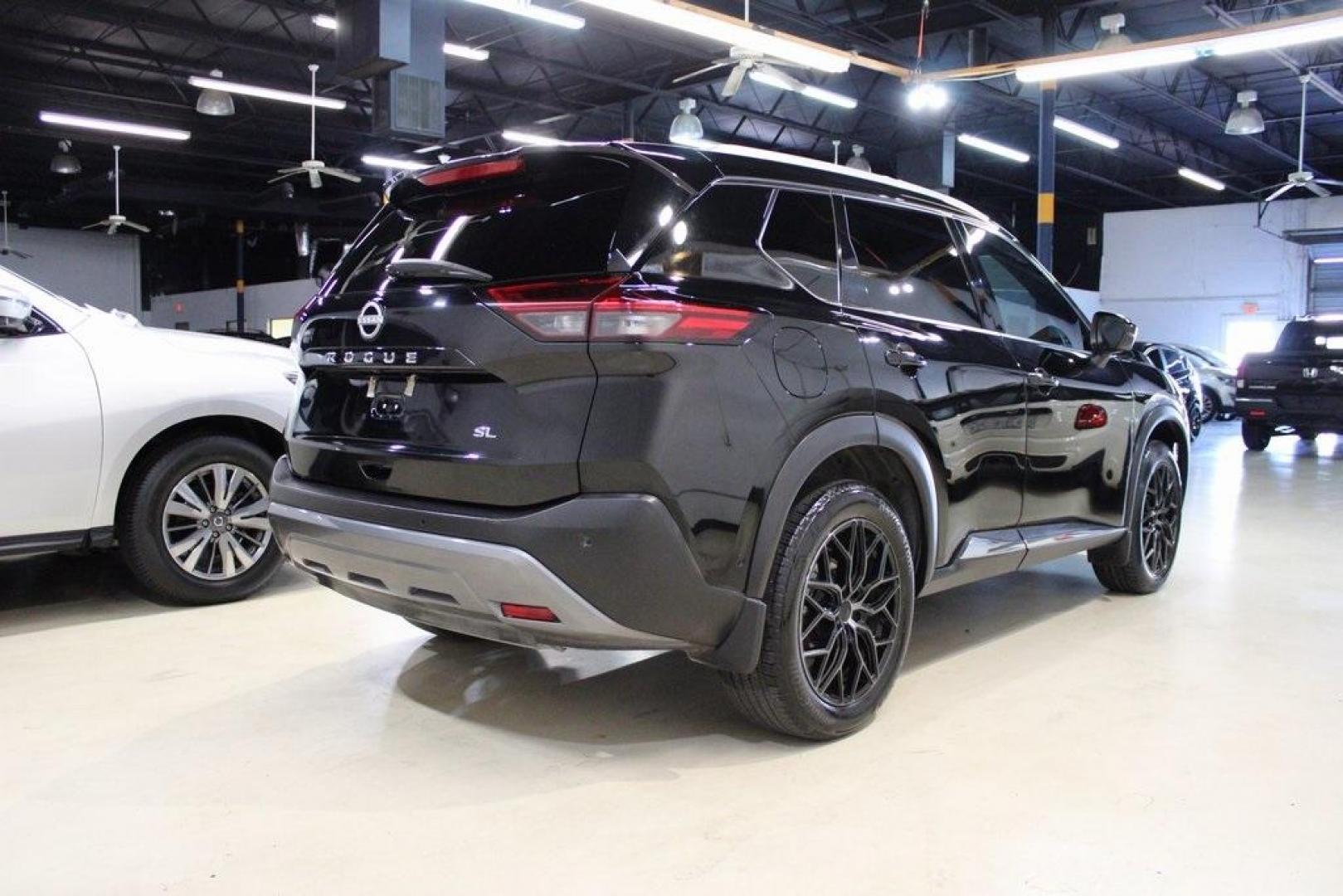 2023 Super Black /Charcoal Nissan Rogue SL (5N1BT3CA6PC) with an 1.5L I3 Turbocharged DOHC 12V LEV3-ULEV50 201hp engine, CVT transmission, located at 15300 Midway Rd., Addison, TX, 75001, (972) 702-0011, 32.958321, -96.838074 - Photo#1